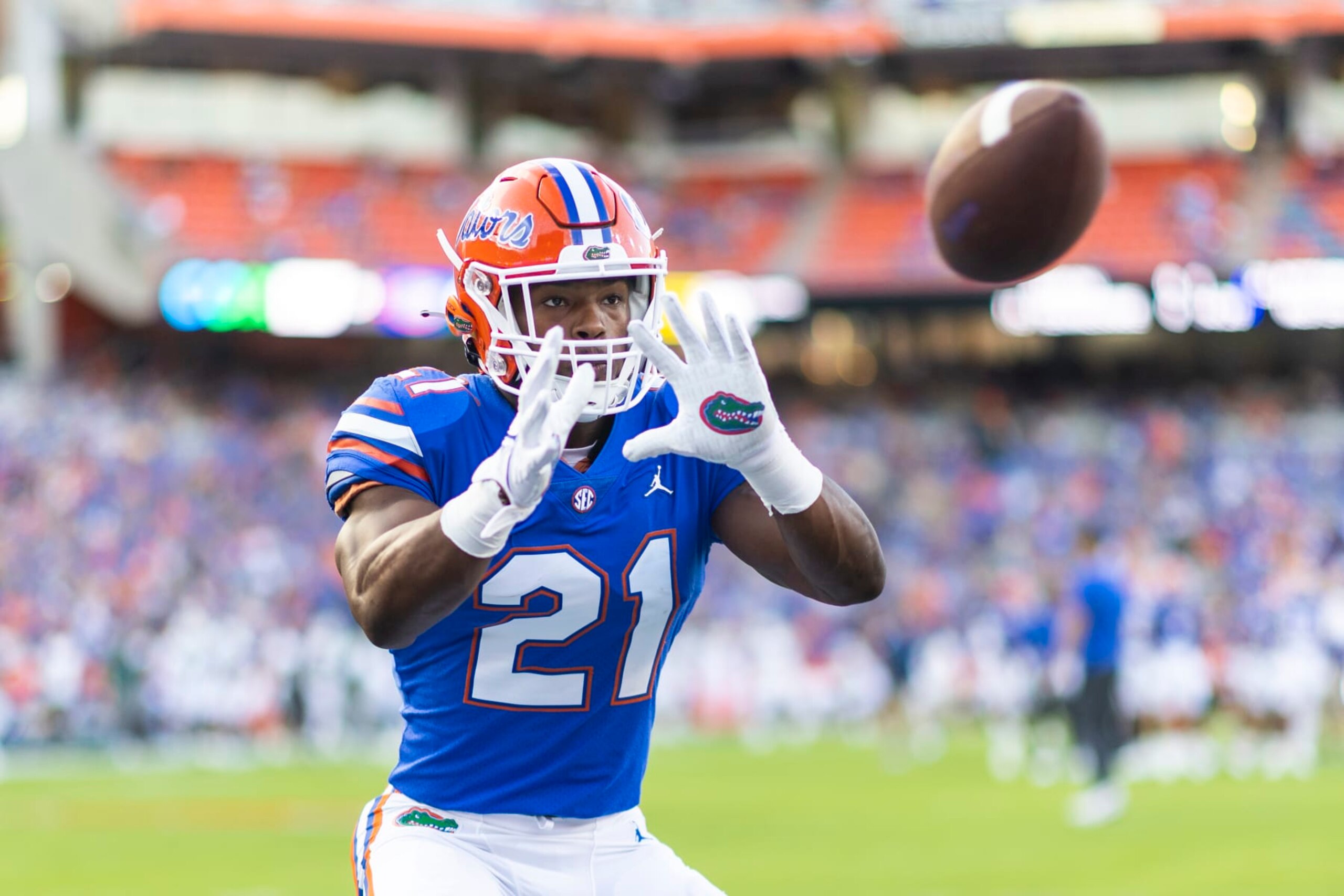 GAINESVILLE, FLORIDA - SEPTEMBER 17: Lorenzo Lingard #21 of the Florida Gators catches a pass before the start of a game against the South Florida Bulls at Ben Hill Griffin Stadium on September 17, 2022 in Gainesville, Florida. (Photo by James Gilbert/Getty Images)