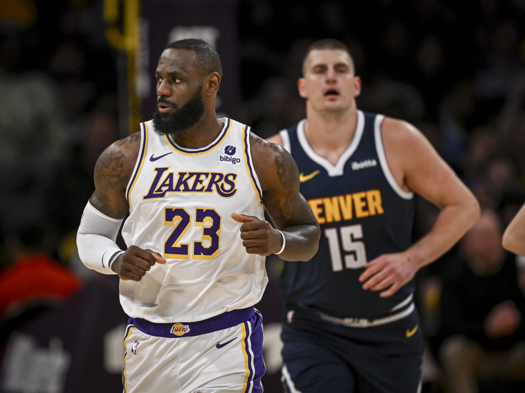 LOS ANGELES, CA - APRIL 27: Nikola Jokic (15) of the Denver Nuggets and LeBron James (23) of the Los Angeles Lakers square off during the first half at Crypto.com Arena in Los Angeles on Saturday, April 27, 2024. (Photo by AAron Ontiveroz/The Denver Post)