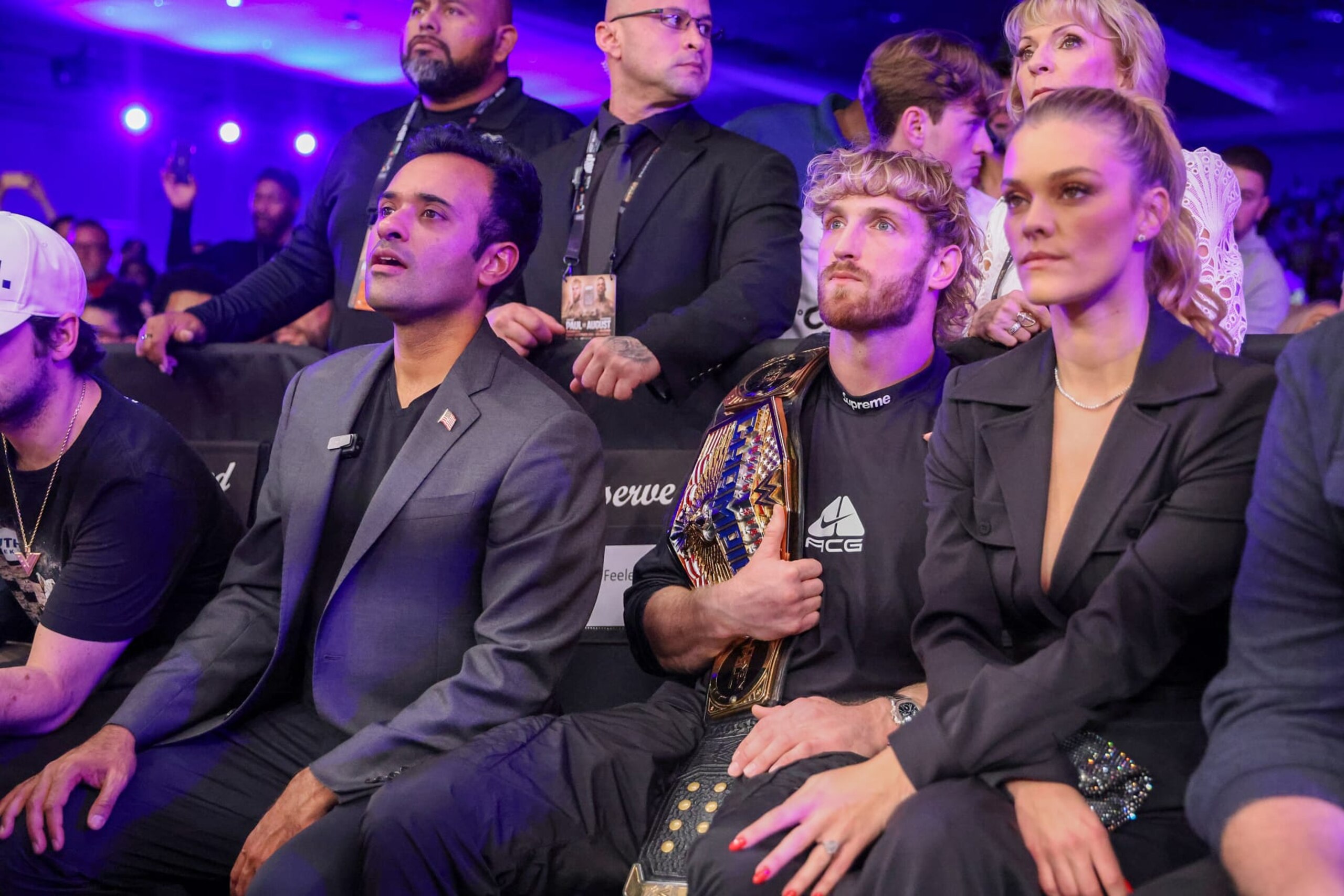 ORLANDO, FL - DECEMBER 15: Vivek Ramaswamy watches with Logan Paul and Nina Agdal as Jake Paul and Andre August fight during the Jake Paul v Andre August at the Caribe Royale Orlando on December 15 2023 in Orlando, Florida. (Photo by Alex Menendez/Getty Images)