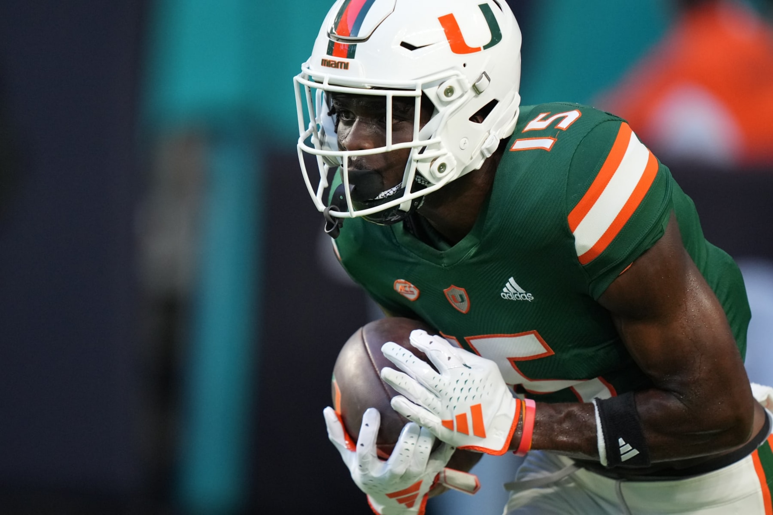 MIAMI GARDENS, FL - SEPTEMBER 14: Miami Hurricanes wide receiver Tyler Harrell (15) warms up before the game between the Bethune-Cookman Wildcats and the Miami Hurricanes on Thursday, September 14, 2023 at Hard Rock Stadium, Miami Gardens, Fla. (Photo by Peter Joneleit/Icon Sportswire via Getty Images)