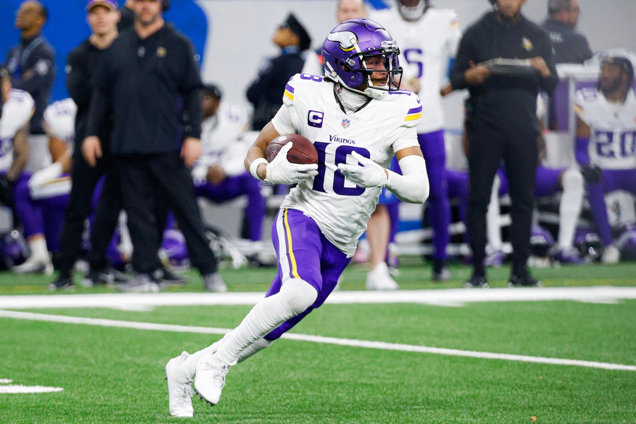 DETROIT, MICHIGAN - JANUARY 07: Justin Jefferson #18 of the Minnesota Vikings runs the ball up the field after a catch during the second half of a game against the Detroit Lions at Ford Field on January 07, 2024 in Detroit, Michigan. (Photo by Mike Mulholland/Getty Images) DETROIT, MICHIGAN - JANUARY 07: Justin Jefferson #18 of the Minnesota Vikings runs the ball up the field after a catch during the second half of a game against the Detroit Lions at Ford Field on January 07, 2024 in Detroit, Michigan. (Photo by Mike Mulholland/Getty Images)