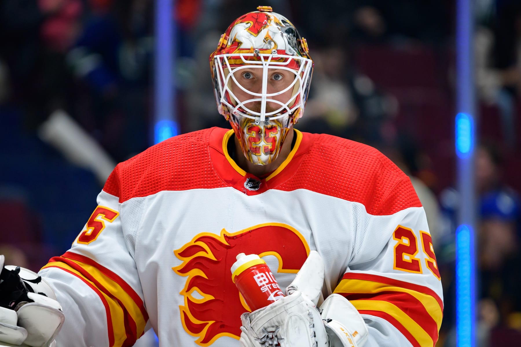 VANCOUVER, CANADA - APRIL 16: Jacob Markstrom #25 of the Calgary Flames looks on during the first period of the NHL game against the Vancouver Canucks at Rogers Arena on April 16, 2024 in Vancouver, British Columbia, Canada. (Photo by Derek Cain/Getty Images)