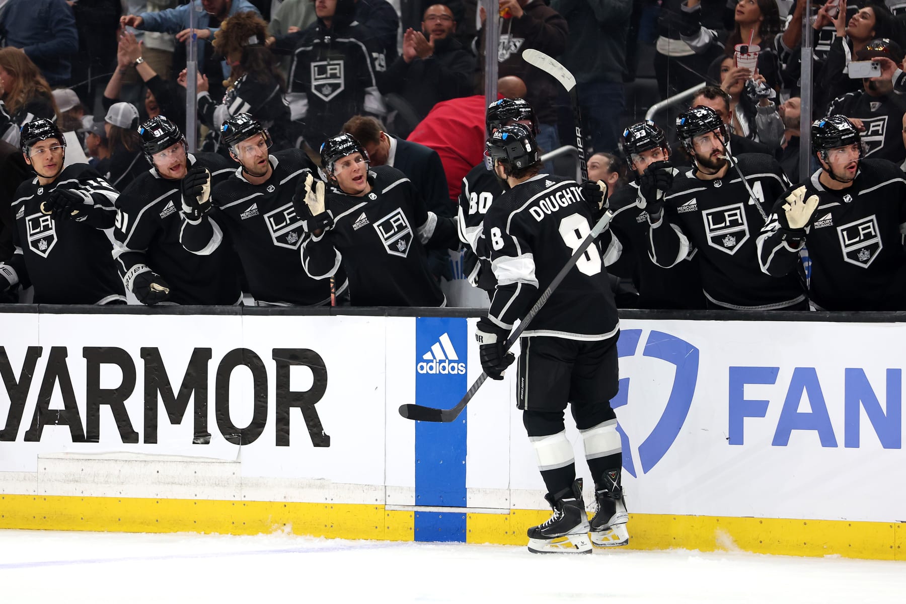 LOS ANGELES, CALIFORNIA - APRIL 26: Drew Doughty #8 of the Los Angeles Kings is congratulated at the bench after scoring a goal during the second period of Game Three of the First Round of the 2024 Stanley Cup Playoffs against the Edmonton Oilers at Crypto.com Arena on April 26, 2024 in Los Angeles, California.  (Photo by Sean M. Haffey/Getty Images)