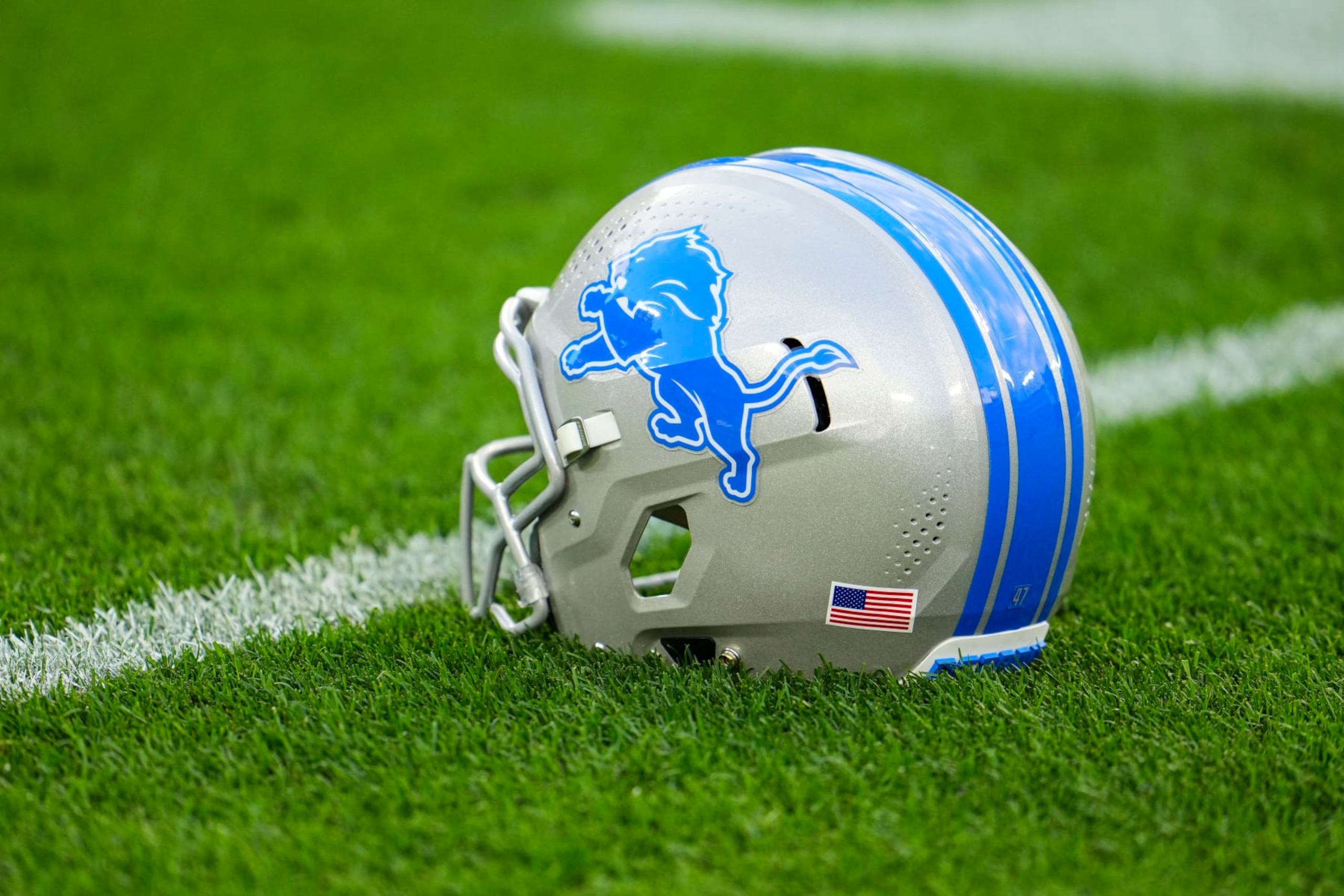 GREEN BAY, WI - SEPTEMBER 28:  Detailed view of a Detroit Lions helmet prior to an NFL football game at Lambeau Field on September 28, 2023 in Green Bay, Wisconsin. (Photo by Cooper Neill/Getty Images)