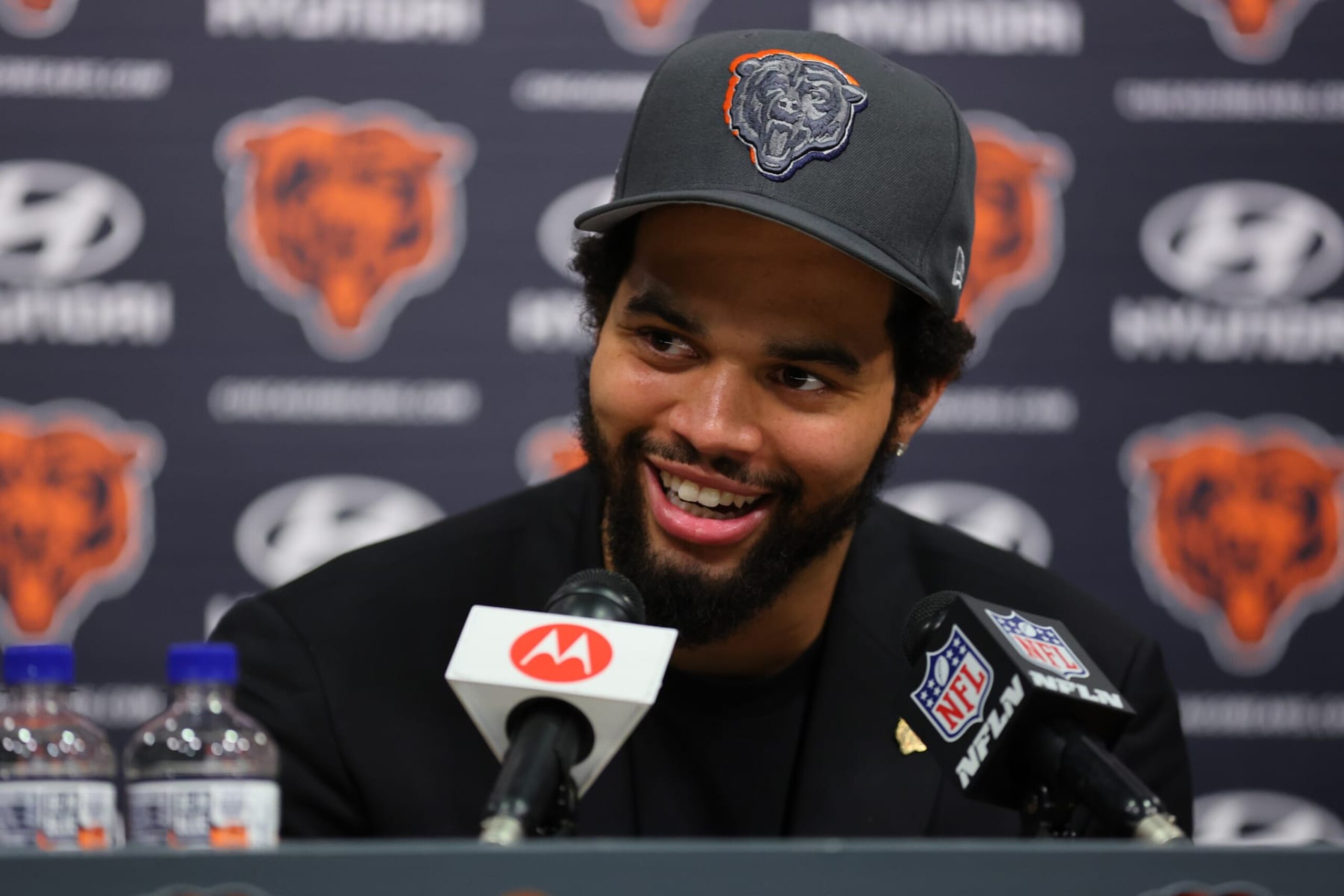 LAKE FOREST, ILLINOIS - APRIL 26: Caleb Williams #18 of the Chicago Bears speaks answers a question from the media during his introductory press conference at Halas Hall on April 26, 2024 in Lake Forest, Illinois. Caleb Williams was drafted first overall in the 2024 NFL Draft on Thursday. (Photo by Michael Reaves/Getty Images)