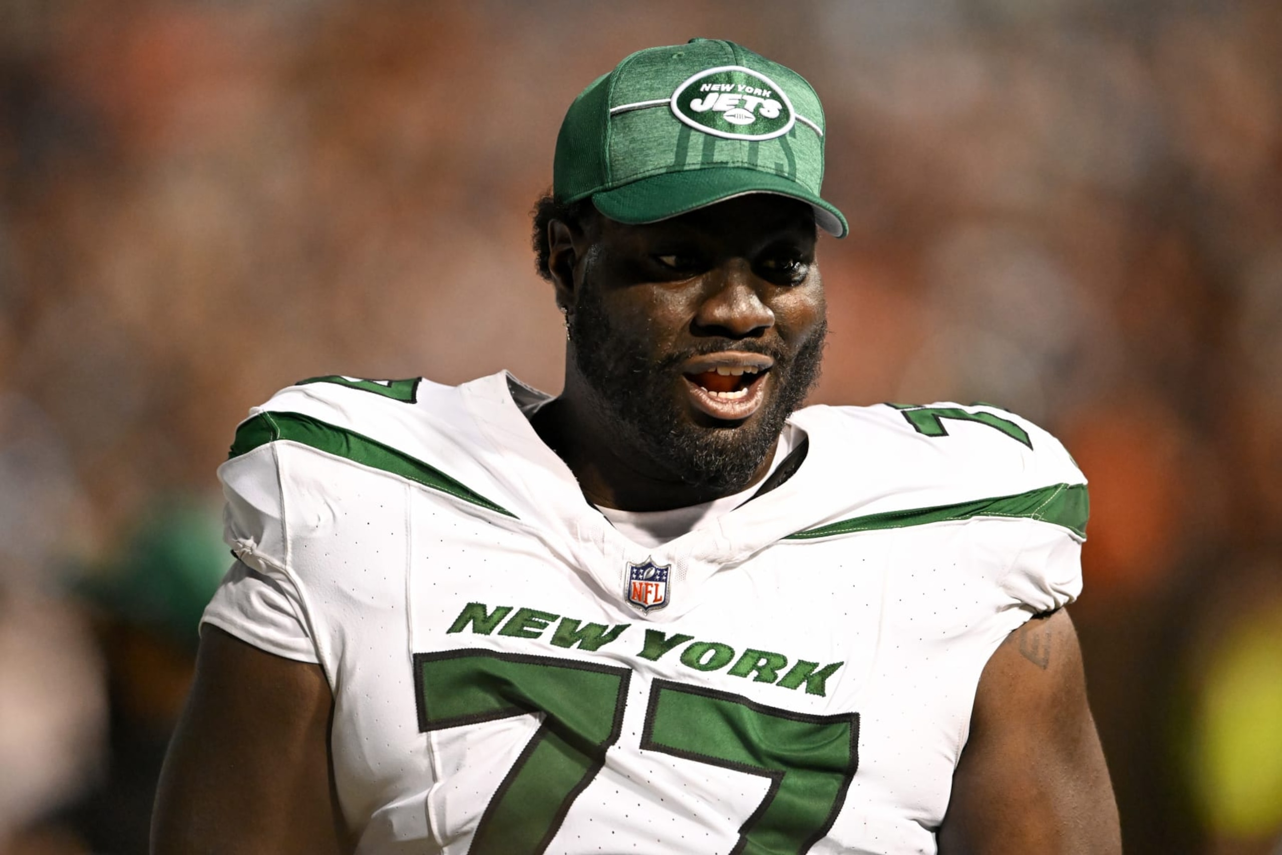 CANTON, OHIO - AUGUST 03: Mekhi Becton #77 of the New York Jets looks on during the second half of the 2023 Pro Hall of Fame Game against the Cleveland Browns at Tom Benson Hall Of Fame Stadium on August 03, 2023 in Canton, Ohio. (Photo by Nick Cammett/Diamond Images via Getty Images)