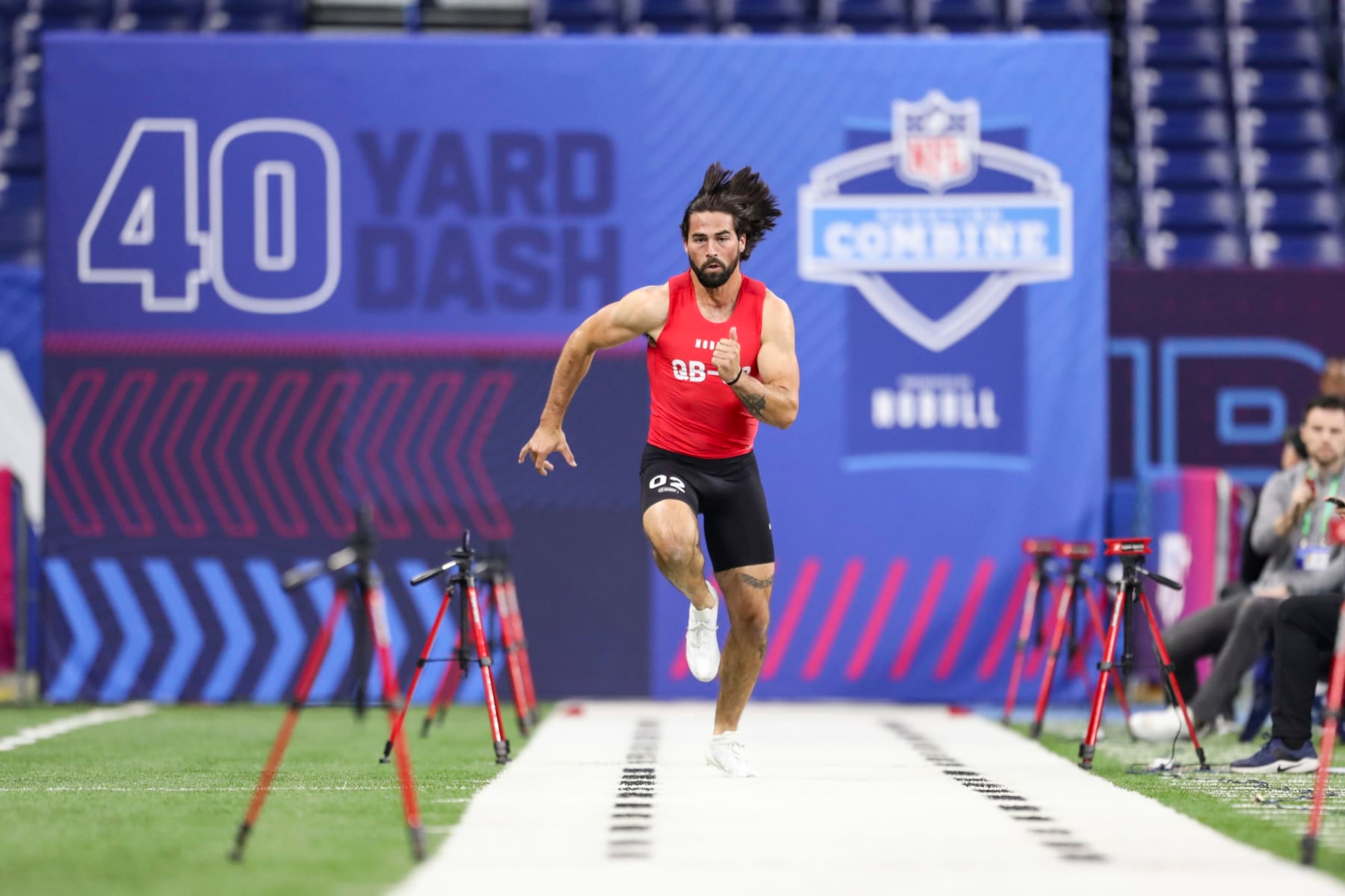 INDIANAPOLIS, INDIANA - MARCH 2: Sam Hartman #QB02 of Notre Dame runs the 40-yard dash during the NFL Scouting Combine at Lucas Oil Stadium on March 2, 2024 in Indianapolis, Indiana. (Photo by Kara Durrette/Getty Images)