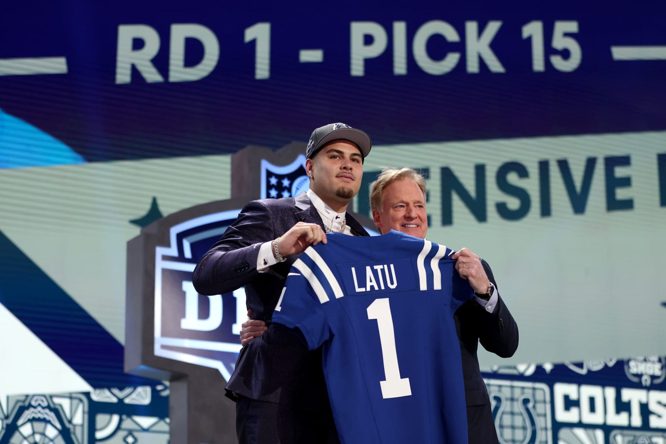 DETROIT, MICHIGAN - APRIL 25: (L-R) Laiatu Latu poses with NFL Commissioner Roger Goodell after being selected 15th overall by the Indianapolis Colts during the first round of the 2024 NFL Draft at Campus Martius Park and Hart Plaza on April 25, 2024 in Detroit, Michigan. (Photo by Gregory Shamus/Getty Images) DETROIT, MICHIGAN - APRIL 25: (L-R) Laiatu Latu poses with NFL Commissioner Roger Goodell after being selected 15th overall by the Indianapolis Colts during the first round of the 2024 NFL Draft at Campus Martius Park and Hart Plaza on April 25, 2024 in Detroit, Michigan. (Photo by Gregory Shamus/Getty Images)