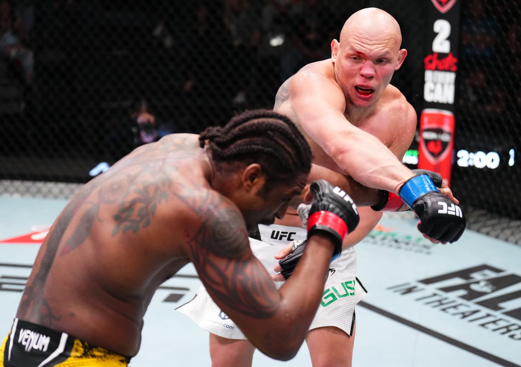 Bogdan Guskov punches Ryan Spann 