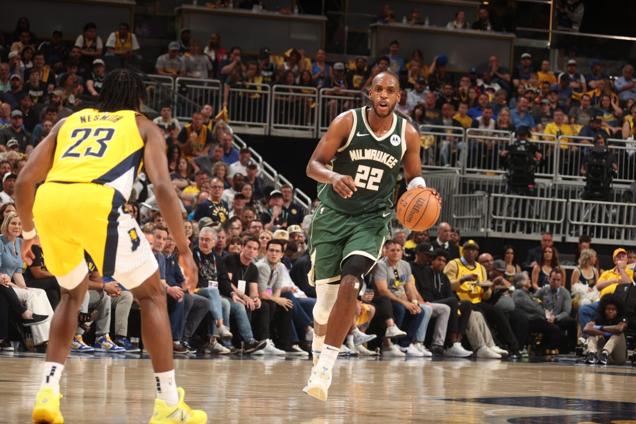 INDIANAPOLIS, IN - APRIL 28: Khris Middleton #22 of the Milwaukee Bucks dribbles the ball during the game against the Indiana Pacers during Round 1 Game 4 of the 2024 NBA Playoffs on April 28, 2024 at Gainbridge Fieldhouse in Indianapolis, Indiana. NOTE TO USER: User expressly acknowledges and agrees that, by downloading and or using this Photograph, user is consenting to the terms and conditions of the Getty Images License Agreement. Mandatory Copyright Notice: Copyright 2024 NBAE (Photo by Nathaniel S. Butler/NBAE via Getty Images)
