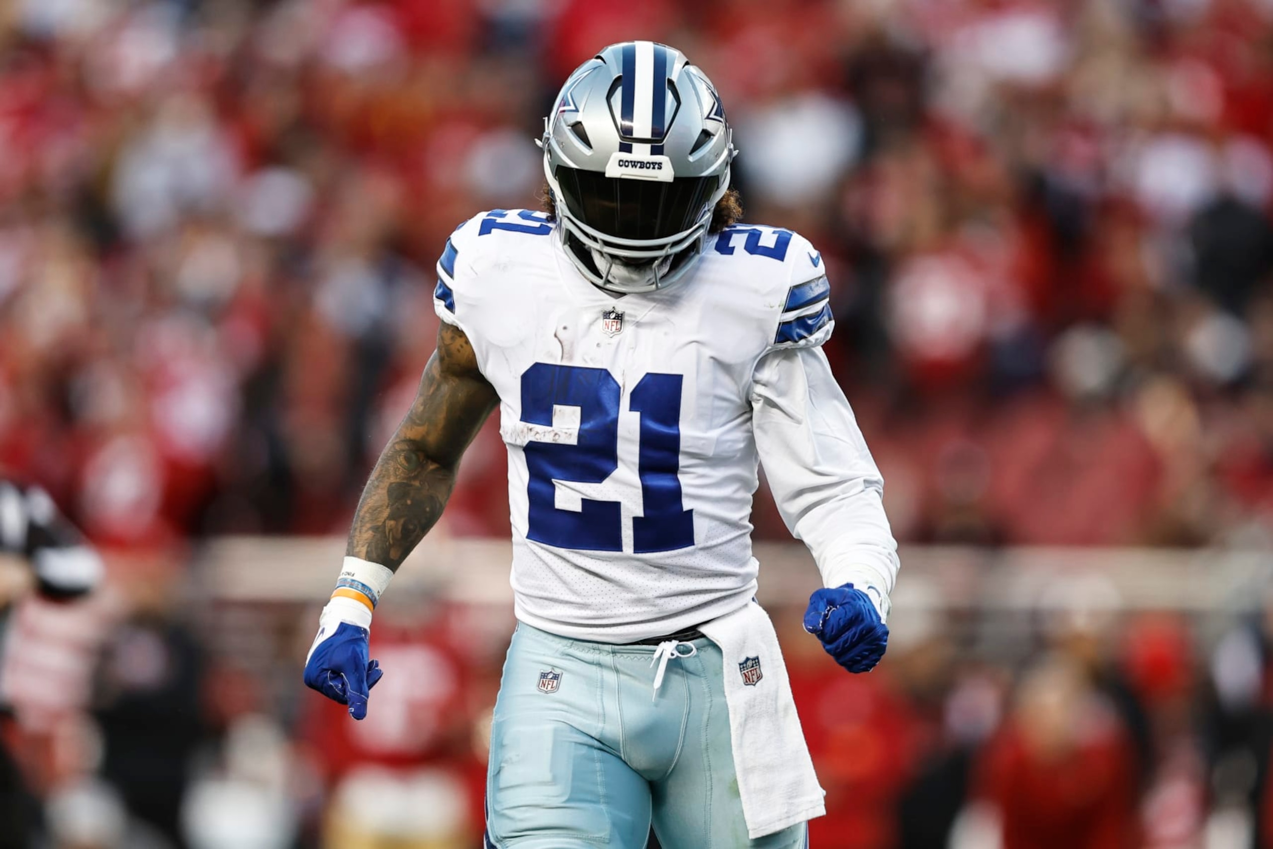 SANTA CLARA, CALIFORNIA - JANUARY 22: Ezekiel Elliott #21 of the Dallas Cowboys looks on during an NFL divisional round playoff football game between the San Francisco 49ers and the Dallas Cowboys at Levi's Stadium on January 22, 2023 in Santa Clara, California. (Photo by Michael Owens/Getty Images)