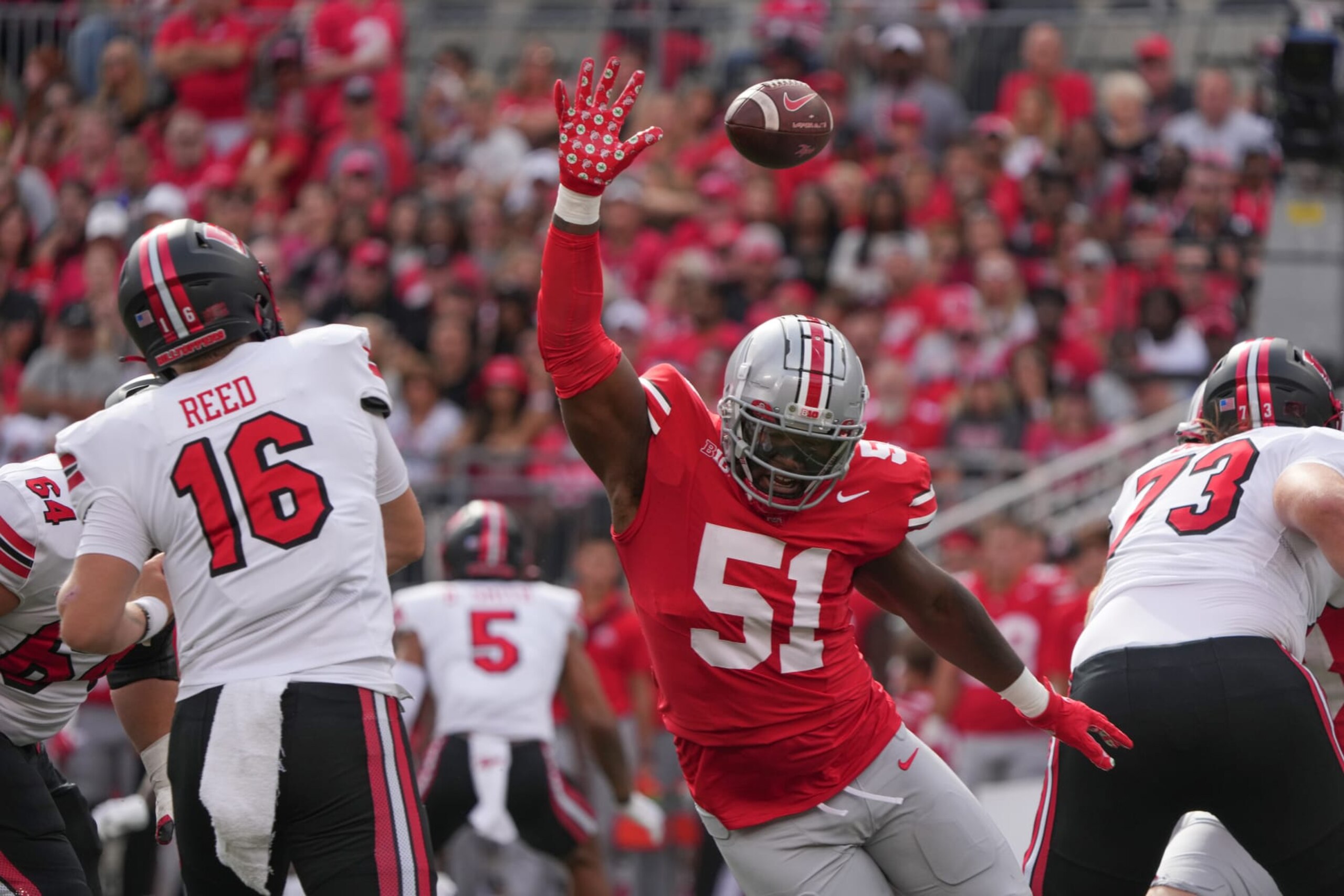 COLUMBUS, OH - SEPTEMBER 16: Defensive tackle Michael Hall Jr. #51 of the Ohio State Buckeyes attempts to block a pass by Quarterback Austin Reed #16 of the Western Kentucky Hilltoppers during the game at Ohio Stadium on September 16, 2023 in Columbus, Ohio. (Photo by Jason Mowry/Icon Sportswire via Getty Images) COLUMBUS, OH - SEPTEMBER 16: Defensive tackle Michael Hall Jr. #51 of the Ohio State Buckeyes attempts to block a pass by Quarterback Austin Reed #16 of the Western Kentucky Hilltoppers during the game at Ohio Stadium on September 16, 2023 in Columbus, Ohio. (Photo by Jason Mowry/Icon Sportswire via Getty Images)