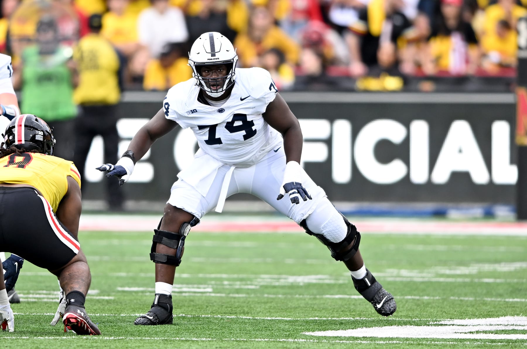 COLLEGE PARK, MARYLAND - NOVEMBER 04: Olumuyiwa Fashanu #74 of the Penn State Nittany Lions blocks against the Maryland Terrapins at SECU Stadium on November 04, 2023 in College Park, Maryland. (Photo by G Fiume/Getty Images)