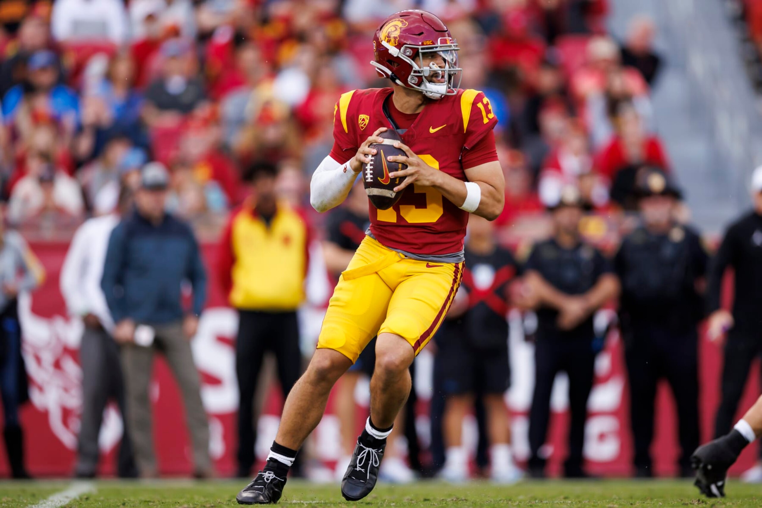 LOS ANGELES, CALIFORNIA - NOVEMBER 18: Caleb Williams #13 of the USC Trojans drops back and looks to throw a pass during the first half of a game against the UCLA Bruins at United Airlines Field at the Los Angeles Memorial Coliseum on November 18, 2023 in Los Angeles, California. (Photo by Ryan Kang/Getty Images) LOS ANGELES, CALIFORNIA - NOVEMBER 18: Caleb Williams #13 of the USC Trojans drops back and looks to throw a pass during the first half of a game against the UCLA Bruins at United Airlines Field at the Los Angeles Memorial Coliseum on November 18, 2023 in Los Angeles, California. (Photo by Ryan Kang/Getty Images)