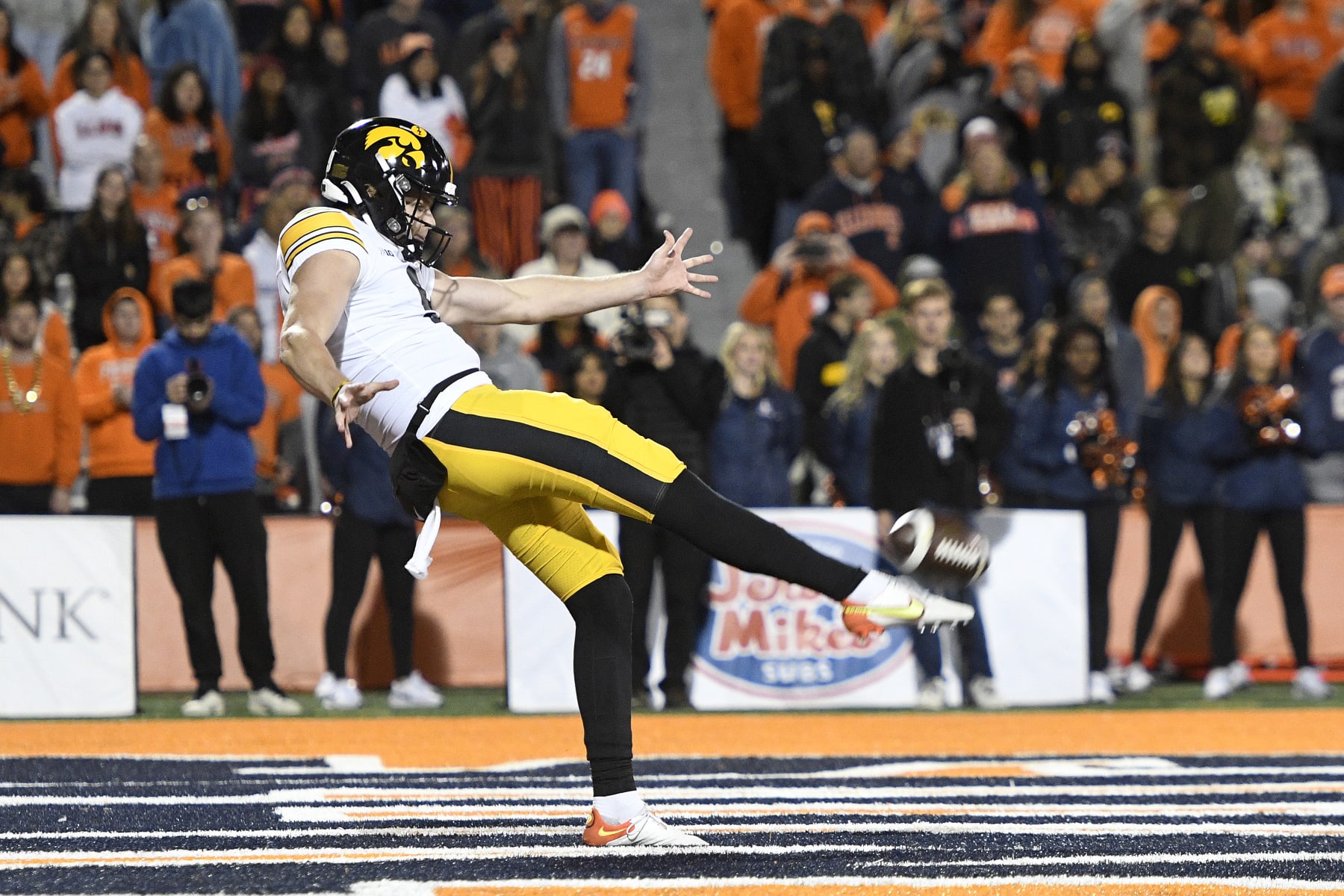 CHAMPAIGN, IL - OCTOBER 08: Iowa Hawkeyes punter Tory Taylor (9) kicks during the college football game between the Iowa Hawkeyes and the Illinois Fighting Illini on October 7, 2022, at Memorial Stadium in Champaign, Illinois. (Photo by Michael Allio/Icon Sportswire via Getty Images)
