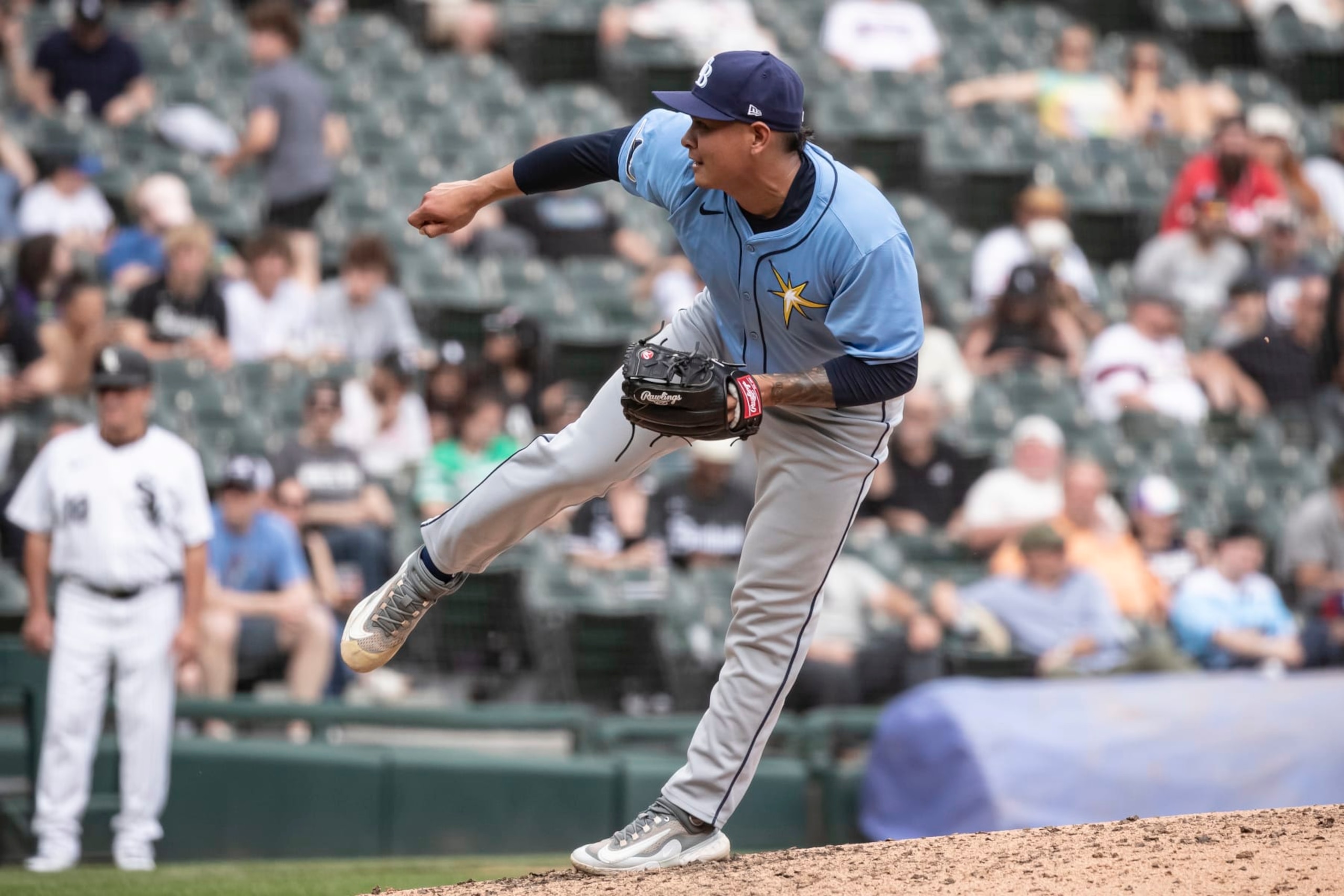 CHICAGO, ILLINOIS - APRIL 28: Manuel Rodríguez #39 of the Tampa Bay Rays delivers a pitch in the seventh inning against the Chicago White Sox at Guaranteed Rate Field on April 28, 2024 in Chicago, Illinois. (Photo by Griffin Quinn/Getty Images) CHICAGO, ILLINOIS - APRIL 28: Manuel Rodríguez #39 of the Tampa Bay Rays delivers a pitch in the seventh inning against the Chicago White Sox at Guaranteed Rate Field on April 28, 2024 in Chicago, Illinois. (Photo by Griffin Quinn/Getty Images)