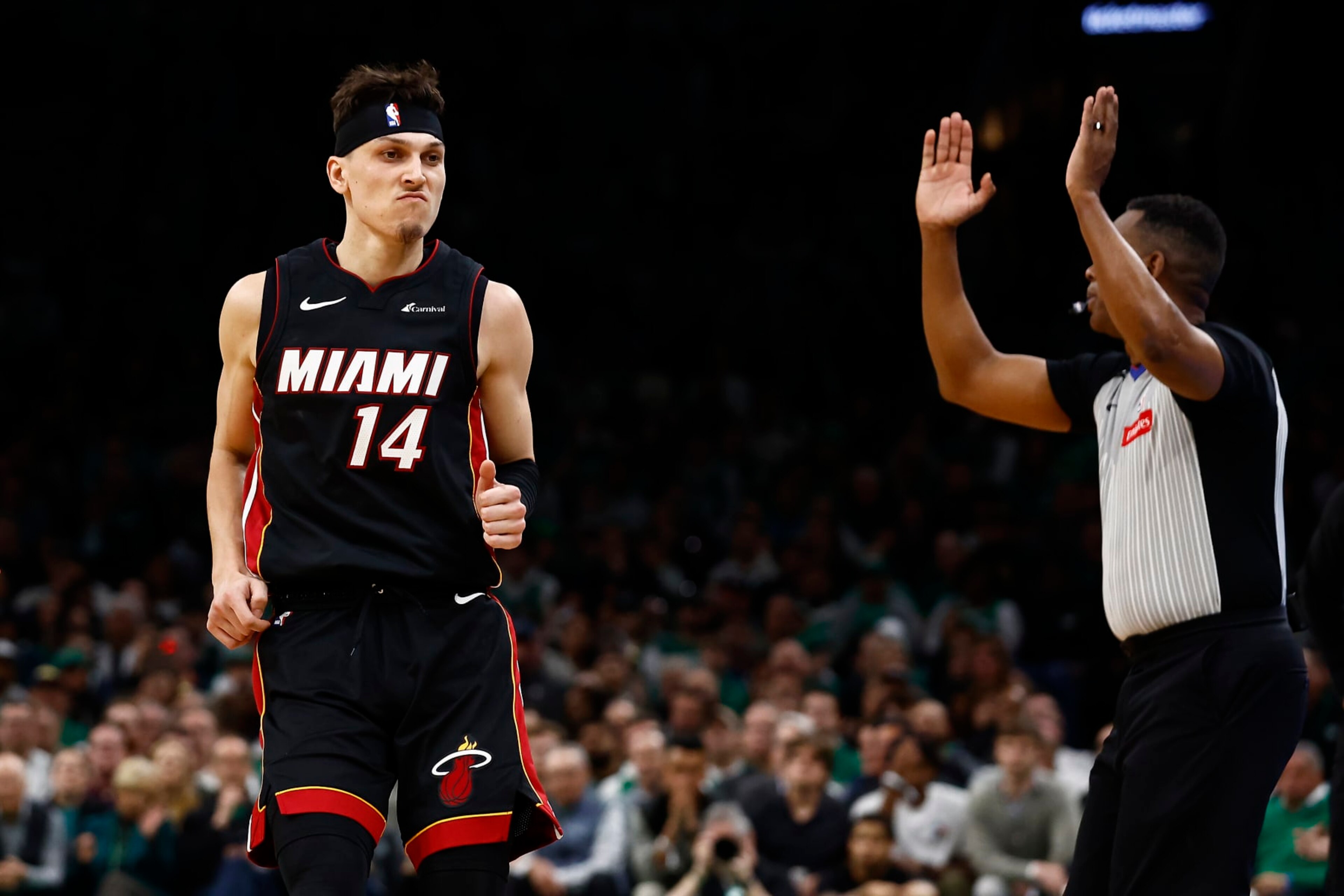 BOSTON, MA - APRIL 24: Tyler Herro #14 of the Miami Heat looks at his bench after making a three-point basket against the Boston Celtics during the second quarter of game two of the Eastern Conference First Round Playoffs at TD Garden on April 24, 2024 in Boston, Massachusetts. NOTE TO USER: User expressly acknowledges and agrees that, by downloading and/or using this Photograph, user is consenting to the terms and conditions of the Getty Images License Agreement. (Photo By Winslow Townson/Getty Images) BOSTON, MA - APRIL 24: Tyler Herro #14 of the Miami Heat looks at his bench after making a three-point basket against the Boston Celtics during the second quarter of game two of the Eastern Conference First Round Playoffs at TD Garden on April 24, 2024 in Boston, Massachusetts. NOTE TO USER: User expressly acknowledges and agrees that, by downloading and/or using this Photograph, user is consenting to the terms and conditions of the Getty Images License Agreement. (Photo By Winslow Townson/Getty Images)