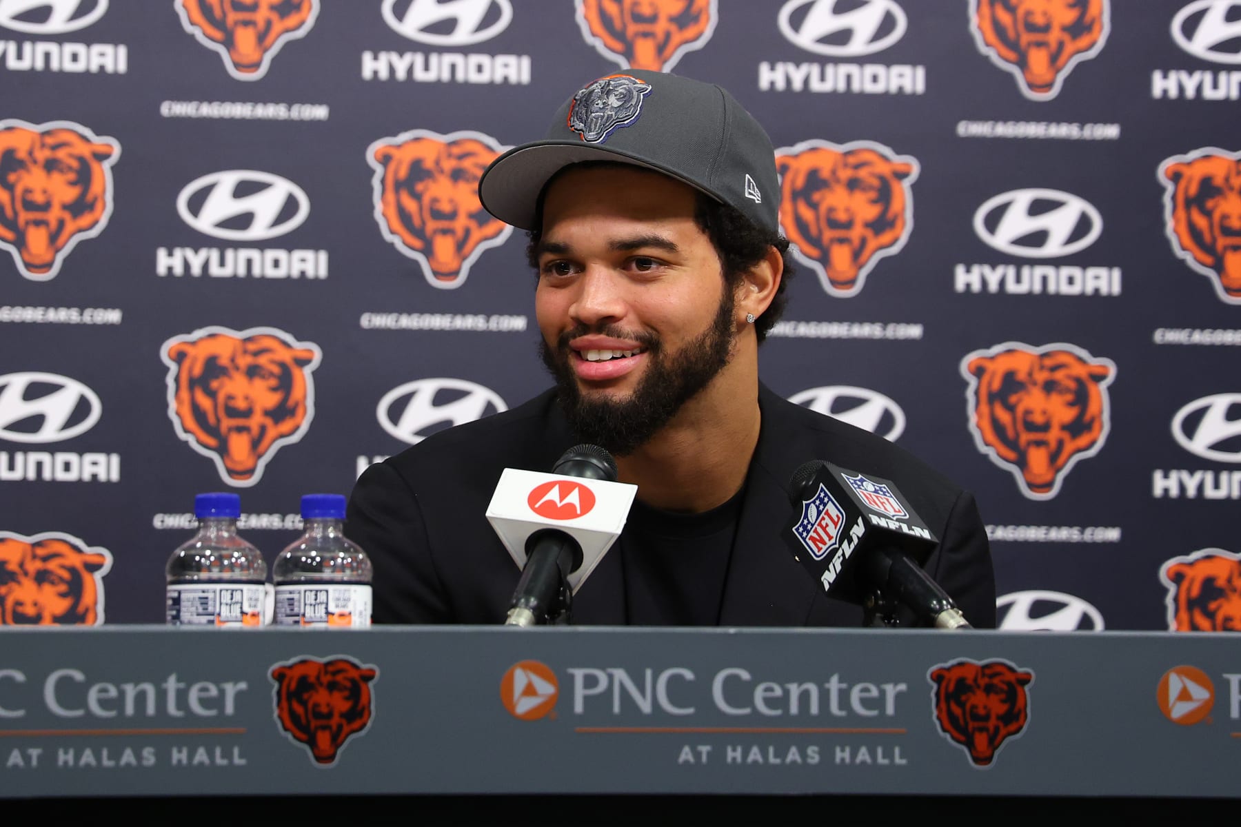 LAKE FOREST, ILLINOIS - APRIL 26: Caleb Williams #18 of the Chicago Bears speaks answers a question from the media during his introductory press conference at Halas Hall on April 26, 2024 in Lake Forest, Illinois. Caleb Williams was drafted first overall in the 2024 NFL Draft on Thursday. (Photo by Michael Reaves/Getty Images)