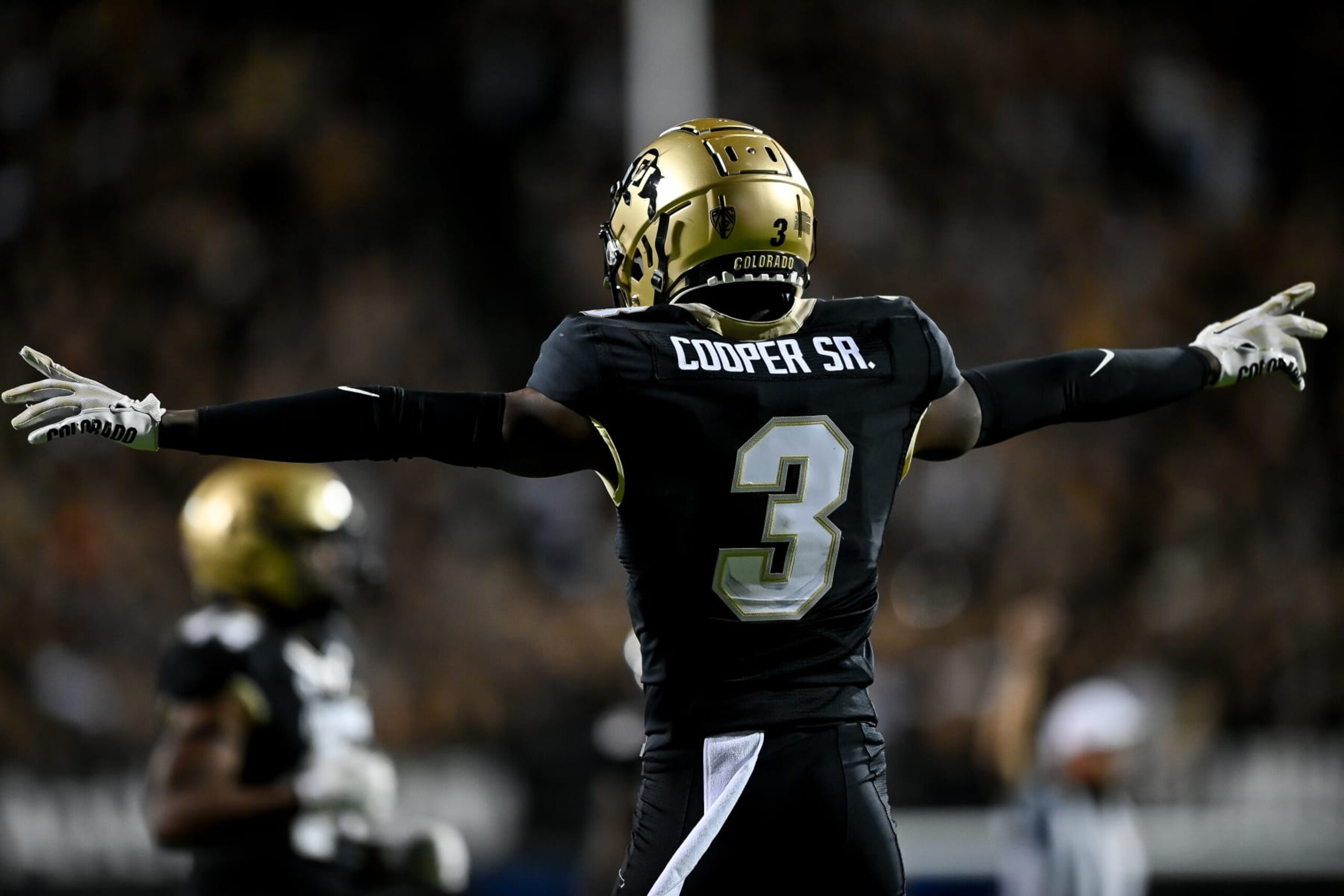 BOULDER, CO - SEPTEMBER 17:  cornerback Omarion Cooper #3 of the Colorado Buffaloes celebrates a defensive play in the second overtime period against the Colorado State Rams at Folsom Field on September 17, 2023 in Boulder, Colorado. (Photo by Dustin Bradford/Getty Images)