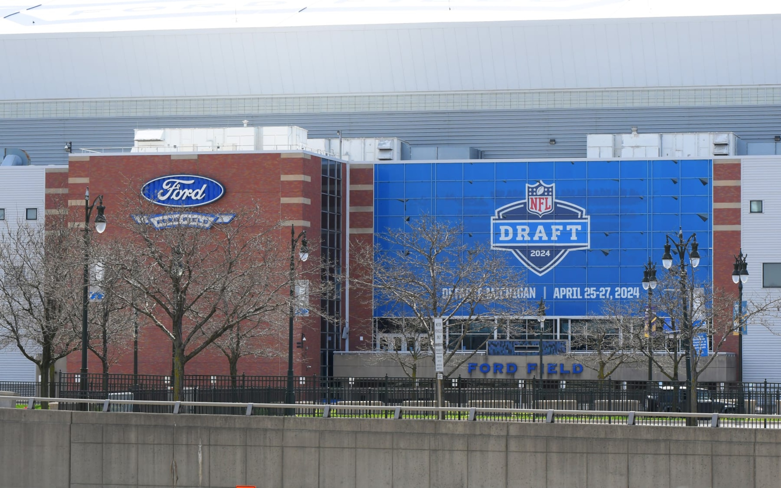 DETROIT, MI - APRIL 18: A general exterior view of Ford Field, home of the NFL Detroit Lions, with a sign displayed to announce the upcoming NFL draft. The draft is scheduled to be held around Campus Martius Park and Hart Plaza in Detroit, Michigan on April 25Â27, 2024. Photo taken prior to the MLB game between the Detroit Tigers and the Texas Rangers at Comerica Park on April 18, 2024 in Detroit, Michigan. (Photo by Mark Cunningham/MLB Photos via Getty Images) DETROIT, MI - APRIL 18: A general exterior view of Ford Field, home of the NFL Detroit Lions, with a sign displayed to announce the upcoming NFL draft. The draft is scheduled to be held around Campus Martius Park and Hart Plaza in Detroit, Michigan on April 25Â27, 2024. Photo taken prior to the MLB game between the Detroit Tigers and the Texas Rangers at Comerica Park on April 18, 2024 in Detroit, Michigan. (Photo by Mark Cunningham/MLB Photos via Getty Images)