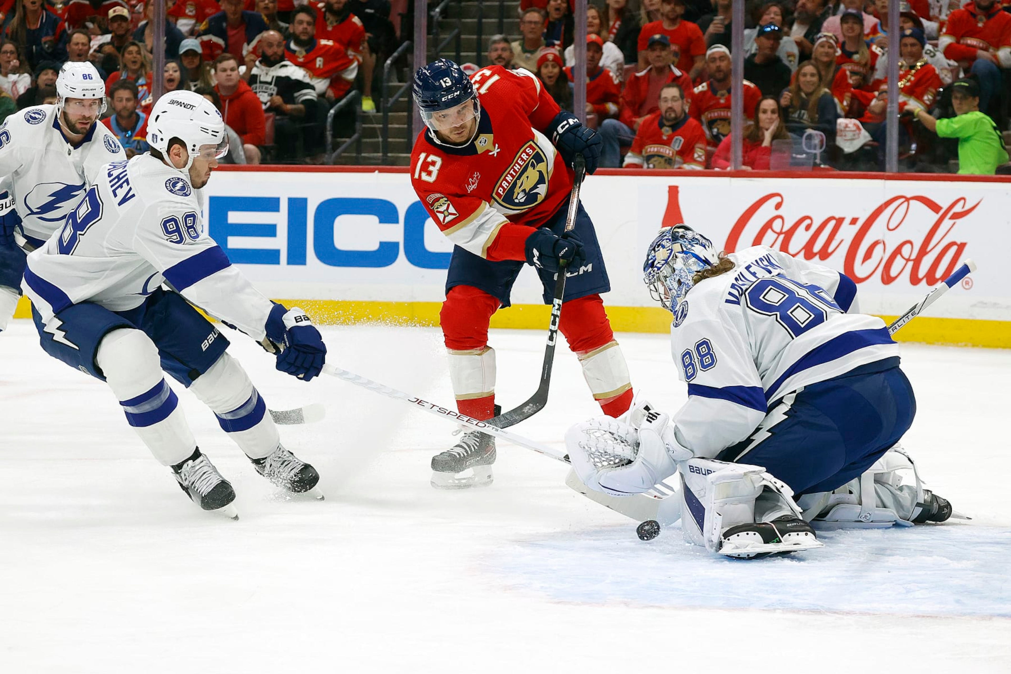 SUNRISE, FLORIDA - APRIL 29: Goaltender Andrei Vasilevskiy #88 of the Tampa Bay Lightning defends the net against Sam Reinhart #13 of the Florida Panthers in Game Five of the First Round of the 2024 Stanley Cup Playoffs at the Amerant Bank Arena on April 29, 2024 in Sunrise, Florida. (Photo by Eliot J. Schechter/NHLI via Getty Images) SUNRISE, FLORIDA - APRIL 29: Goaltender Andrei Vasilevskiy #88 of the Tampa Bay Lightning defends the net against Sam Reinhart #13 of the Florida Panthers in Game Five of the First Round of the 2024 Stanley Cup Playoffs at the Amerant Bank Arena on April 29, 2024 in Sunrise, Florida. (Photo by Eliot J. Schechter/NHLI via Getty Images)