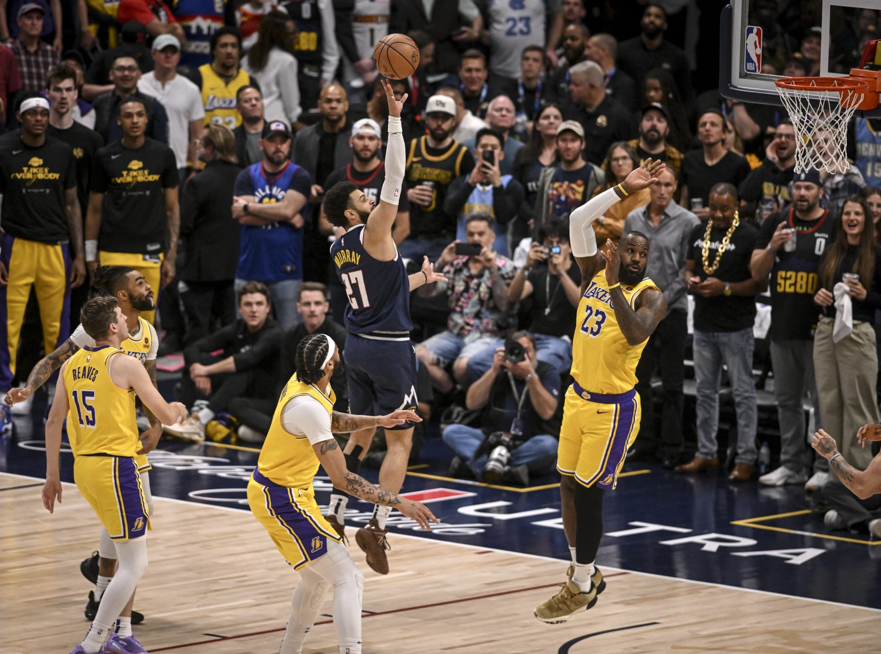 DENVER, CO - APRIL 29: Jamal Murray (27) of the Denver Nuggets hits a floater over LeBron James (23) of the Los Angeles Lakers during the first quarter at Ball Arena in Denver, Colorado on Monday, April 29, 2024. (Photo by AAron Ontiveroz/The Denver Post)