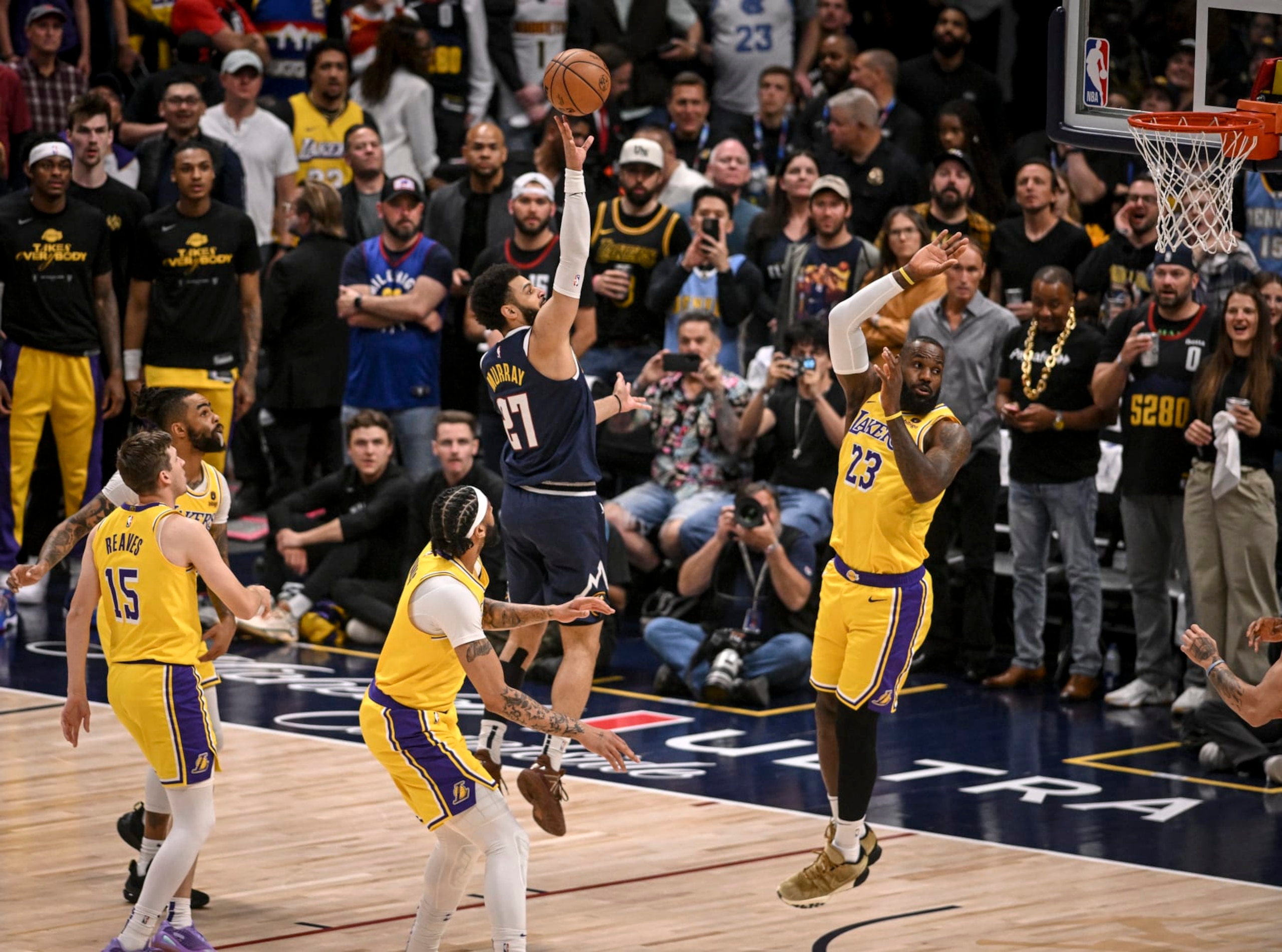DENVER, CO - APRIL 29: Jamal Murray (27) of the Denver Nuggets hits a floater over LeBron James (23) of the Los Angeles Lakers during the first quarter at Ball Arena in Denver, Colorado on Monday, April 29, 2024. (Photo by AAron Ontiveroz/The Denver Post)