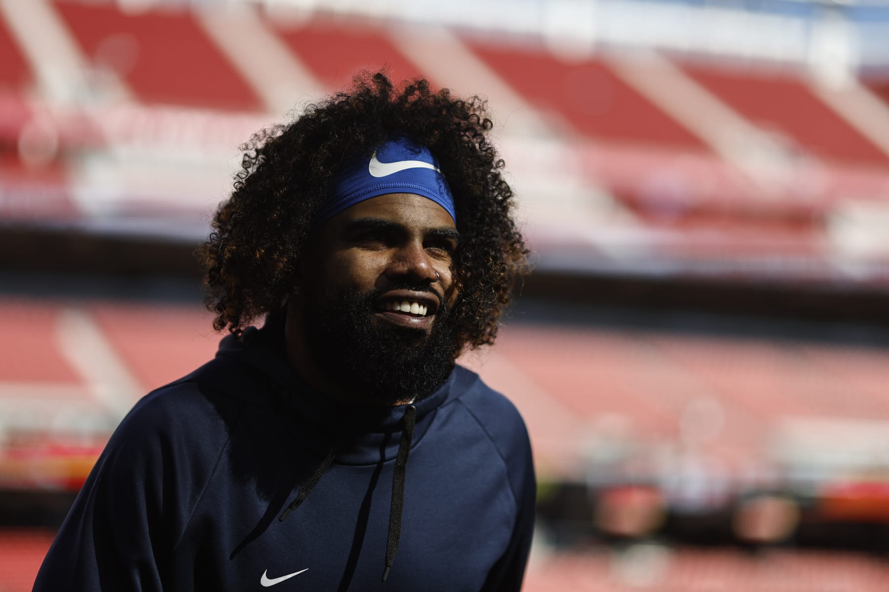 SANTA CLARA, CALIFORNIA - JANUARY 22: Ezekiel Elliott #21 of the Dallas Cowboys reacts as he warms up prior to an NFL divisional round playoff football game between the San Francisco 49ers and the Dallas Cowboys at Levi's Stadium on January 22, 2023 in Santa Clara, California. (Photo by Michael Owens/Getty Images)