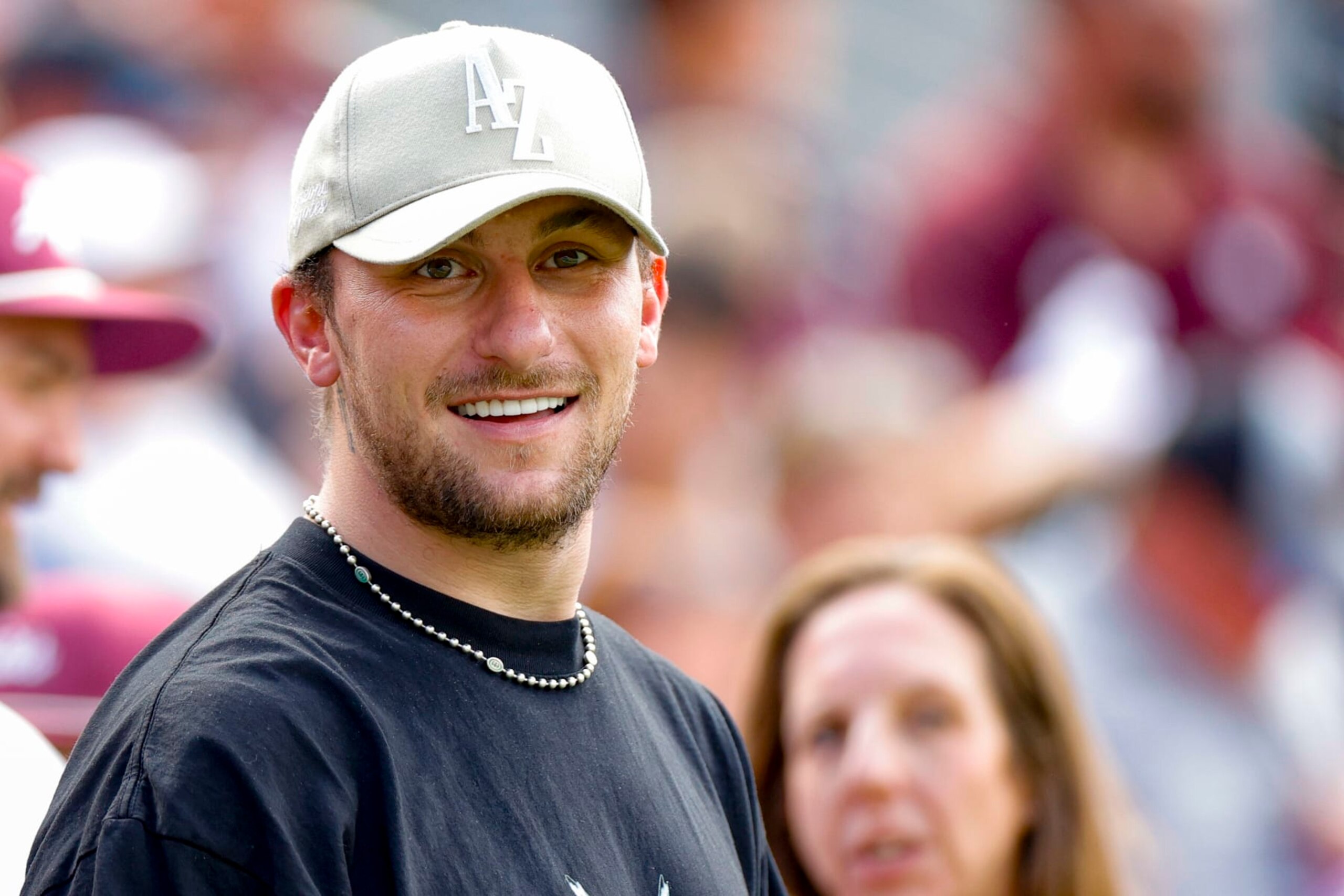 COLLEGE STATION, TEXAS - SEPTEMBER 16: Johnny Manziel looks on  during the first half of a game between the Texas A&M Aggies and the Louisiana Monroe Warhawks at Kyle Field on September 16, 2023 in College Station, Texas. (Photo by Carmen Mandato/Getty Images)