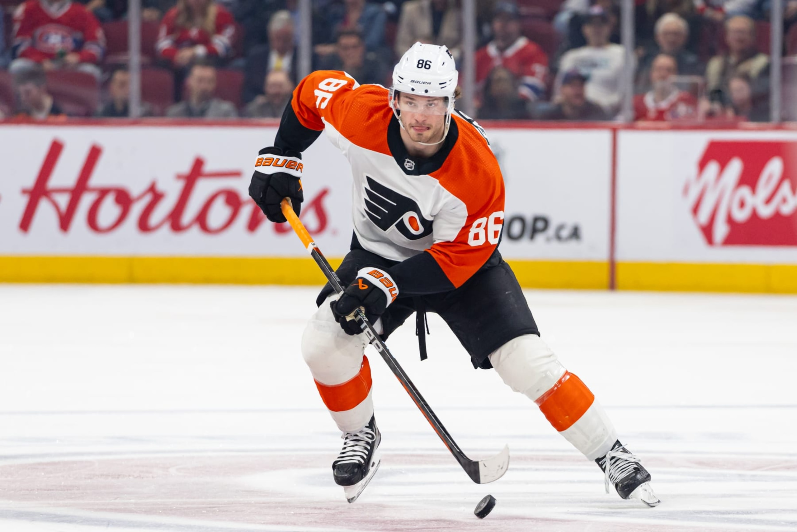 MONTREAL, CANADA - APRIL 9: Joel Farabee #86 of the Philadelphia Flyers crosses centre ice with the puck during the third period of the NHL regular season game against the Montreal Canadiens at the Bell Centre on April 9, 2024 in Montreal, Quebec, Canada. The Montreal Canadiens defeated the Philadelphia Flyers by a score of 9-3. (Photo by Vitor Munhoz/NHLI via Getty Images)
