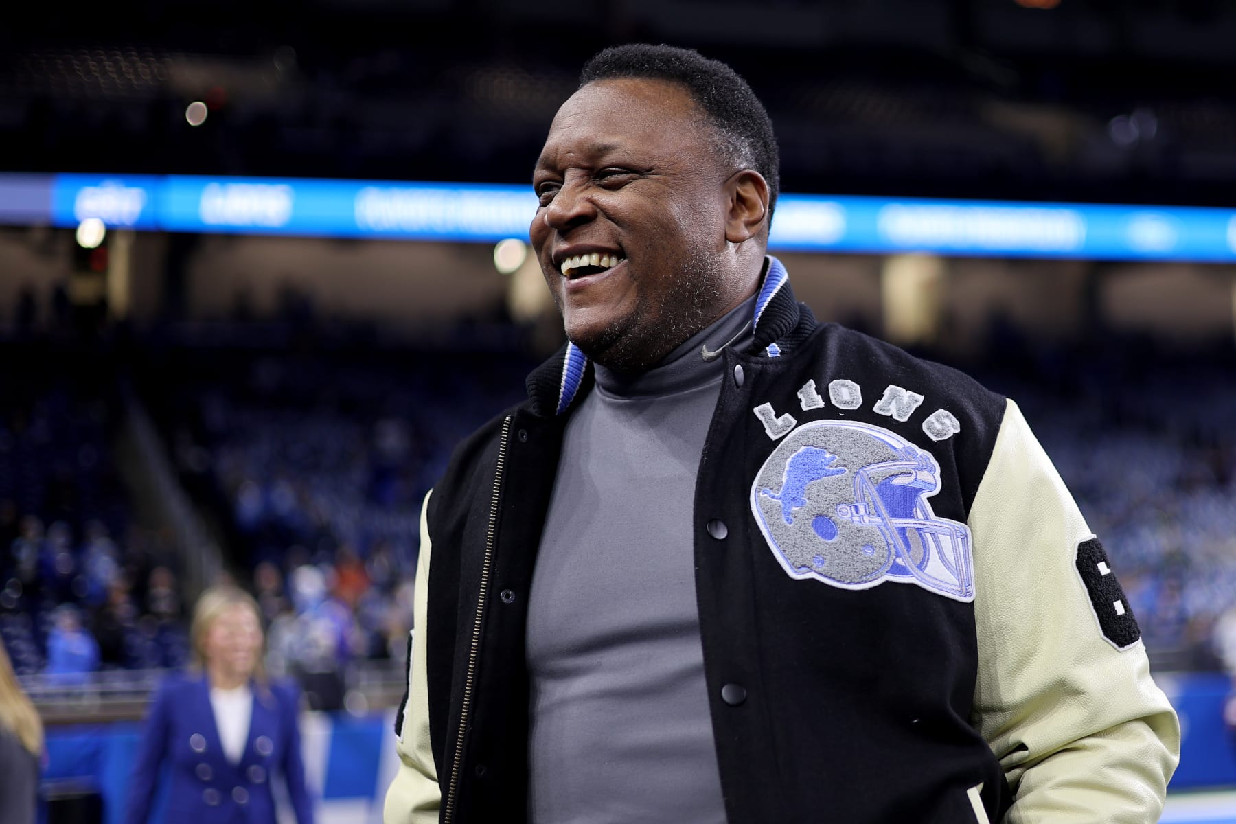 DETROIT, MICHIGAN - JANUARY 14: Former NFL player Barry Sanders of the Detroit Lions reacts prior to a game between the Los Angeles Rams and Detroit Lions in the NFC Wild Card Playoffs at Ford Field on January 14, 2024 in Detroit, Michigan. (Photo by Rey Del Rio/Getty Images)