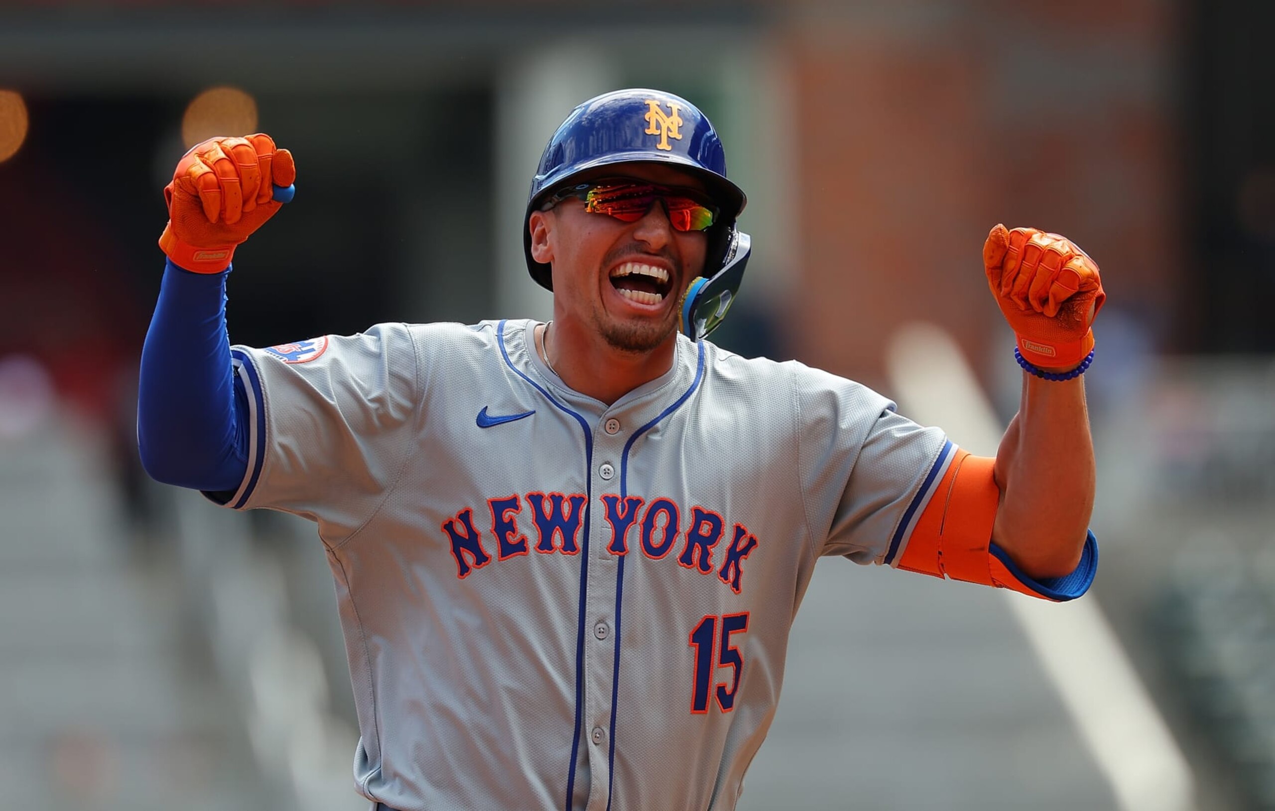 ATLANTA, GEORGIA - APRIL 11:  Tyrone Taylor #15 of the New York Mets reacts as he rounds third base after hitting a grand slam in the ninth inning against the Atlanta Braves at Truist Park on April 11, 2024 in Atlanta, Georgia. (Photo by Kevin C. Cox/Getty Images)