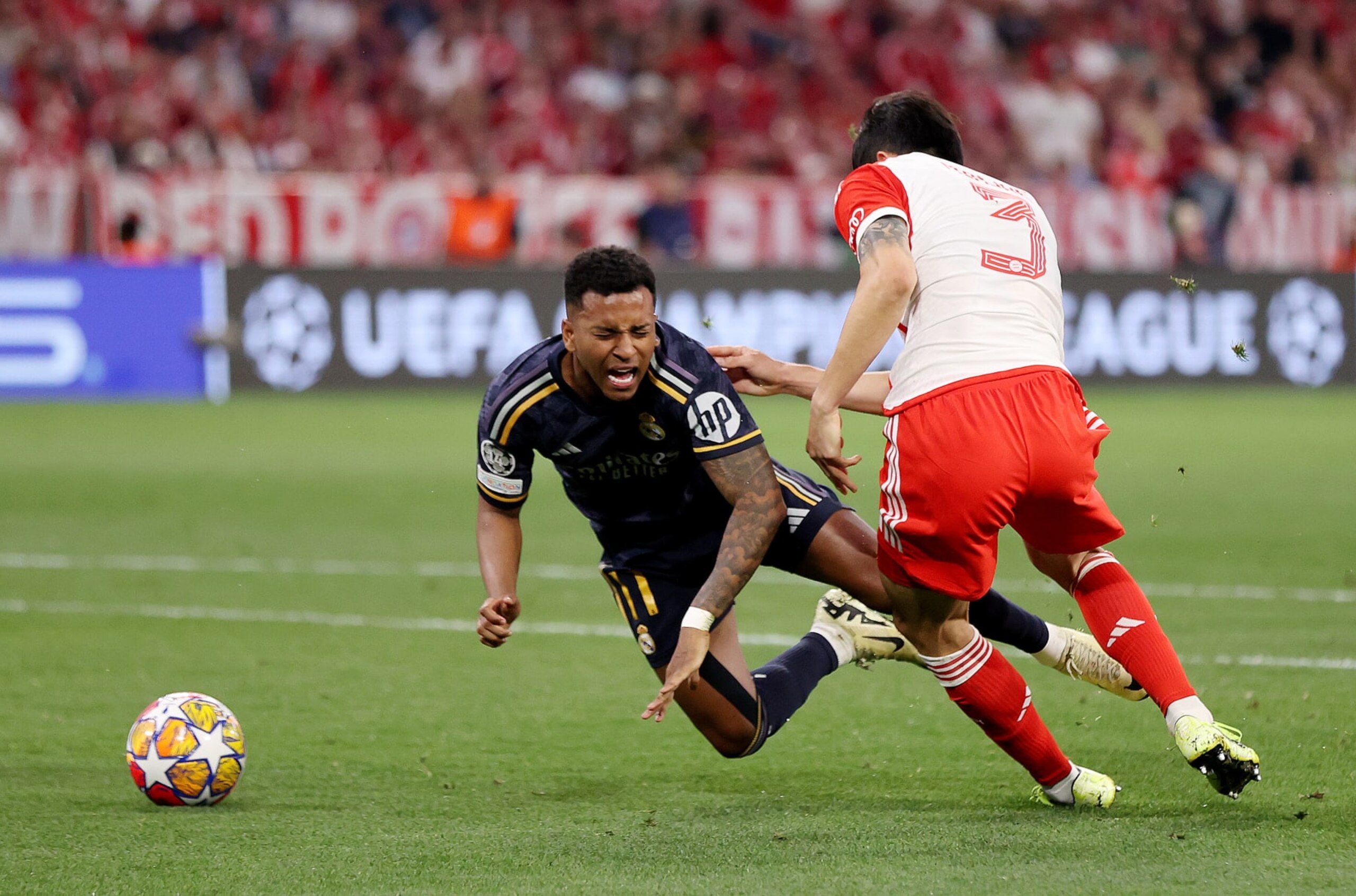 MUNICH, GERMANY - APRIL 30: Rodrygo of Real Madrid is fouled by Kim Min-Jae of Bayern Munich which results in a penalty during the UEFA Champions League semi-final first leg match between FC Bayern München and Real Madrid at Allianz Arena on April 30, 2024 in Munich, Germany. (Photo by Alex Pantling/Getty Images) MUNICH, GERMANY - APRIL 30: Rodrygo of Real Madrid is fouled by Kim Min-Jae of Bayern Munich which results in a penalty during the UEFA Champions League semi-final first leg match between FC Bayern München and Real Madrid at Allianz Arena on April 30, 2024 in Munich, Germany. (Photo by Alex Pantling/Getty Images)