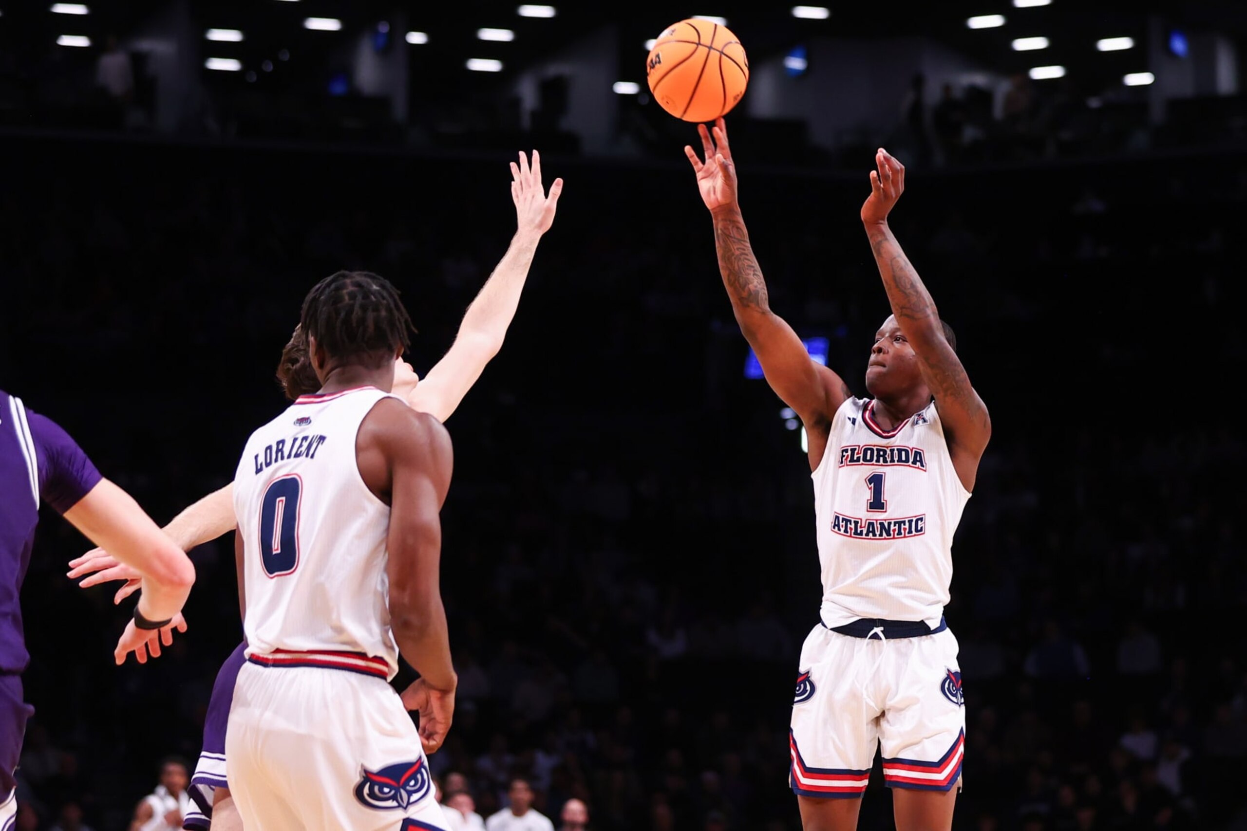 NEW YORK, NEW YORK - MARCH 22: Johnell Davis #1 of the Florida Atlantic Owls shoots the ball during the first half of the game against the Northwestern Wildcats during the first round of the NCAA Men’s Basketball Tournament at Barclays Center on March 22, 2024 in New York City. (Photo by Jamie Schwaberow/NCAA Photos via Getty Images) NEW YORK, NEW YORK - MARCH 22: Johnell Davis #1 of the Florida Atlantic Owls shoots the ball during the first half of the game against the Northwestern Wildcats during the first round of the NCAA Men’s Basketball Tournament at Barclays Center on March 22, 2024 in New York City. (Photo by Jamie Schwaberow/NCAA Photos via Getty Images)