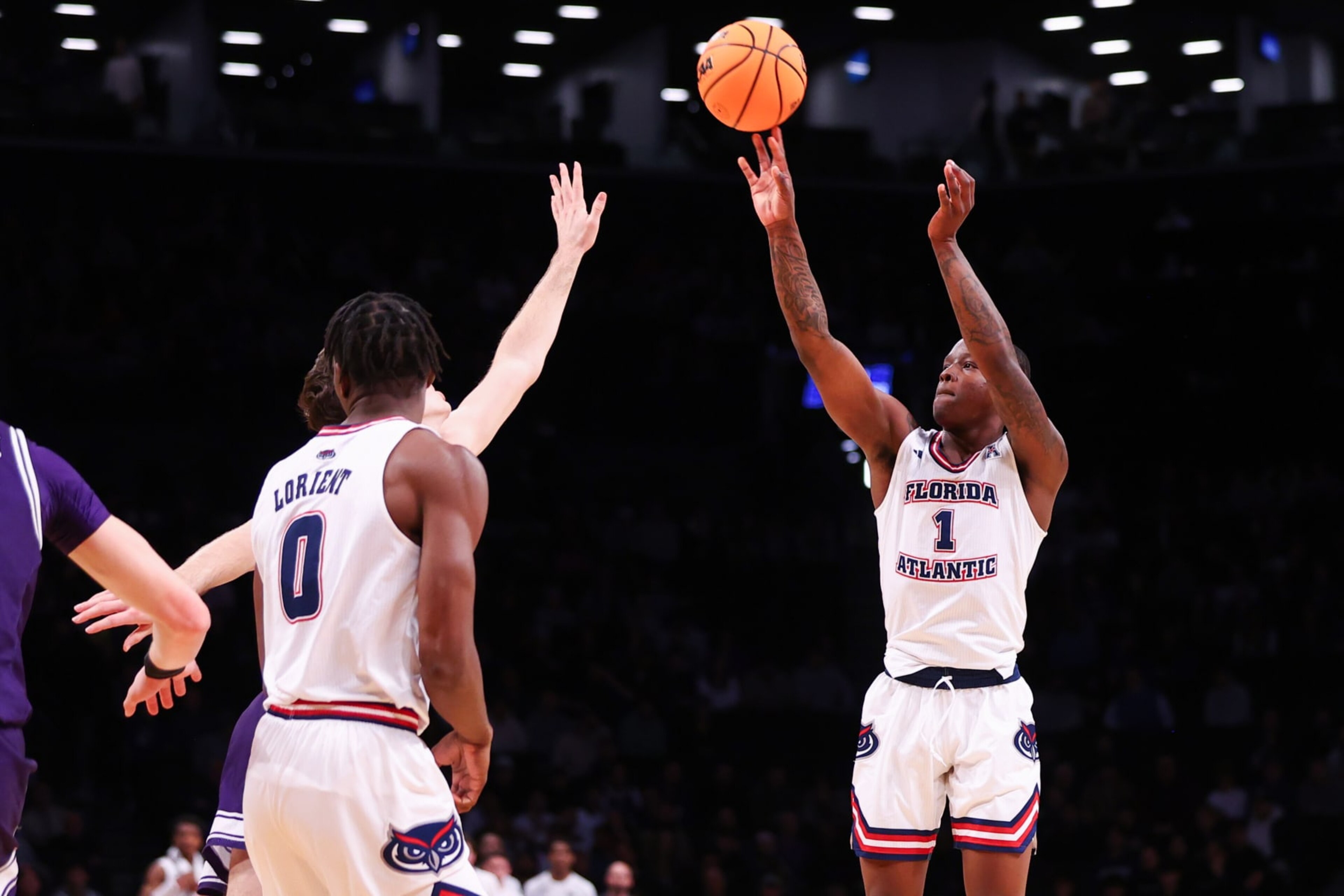 NEW YORK, NEW YORK - MARCH 22: Johnell Davis #1 of the Florida Atlantic Owls shoots the ball during the first half of the game against the Northwestern Wildcats during the first round of the NCAA Men’s Basketball Tournament at Barclays Center on March 22, 2024 in New York City. (Photo by Jamie Schwaberow/NCAA Photos via Getty Images)