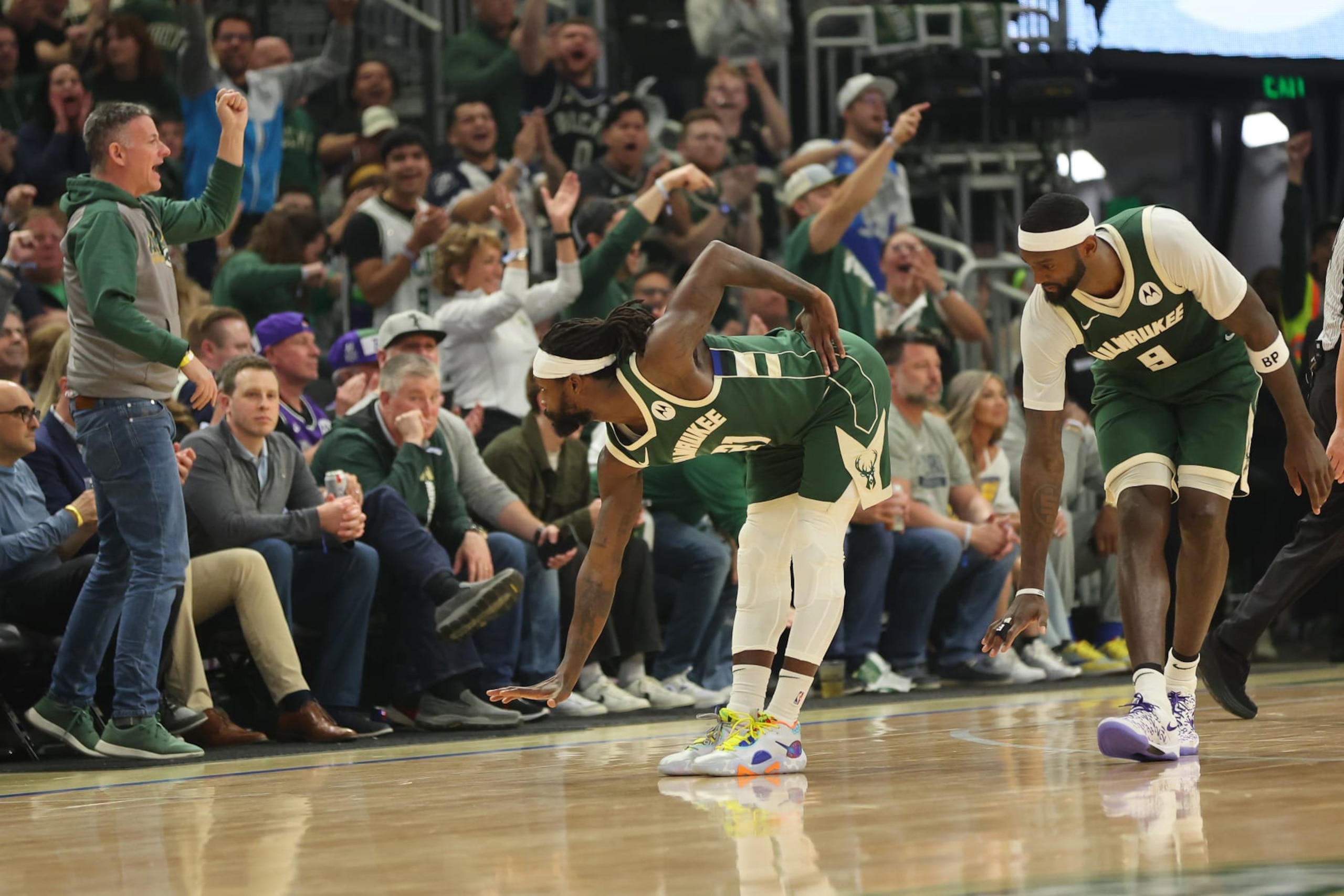 MILWAUKEE, WISCONSIN - APRIL 30: Bobby Portis #9 and Patrick Beverley #21 of the Milwaukee Bucks react to a score against the Indiana Pacers during the first half of game five of the Eastern Conference First Round Playoffs at Fiserv Forum on April 30, 2024 in Milwaukee, Wisconsin.  NOTE TO USER: User expressly acknowledges and agrees that, by downloading and or using this photograph, User is consenting to the terms and conditions of the Getty Images License Agreement. (Photo by Stacy Revere/Getty Images)