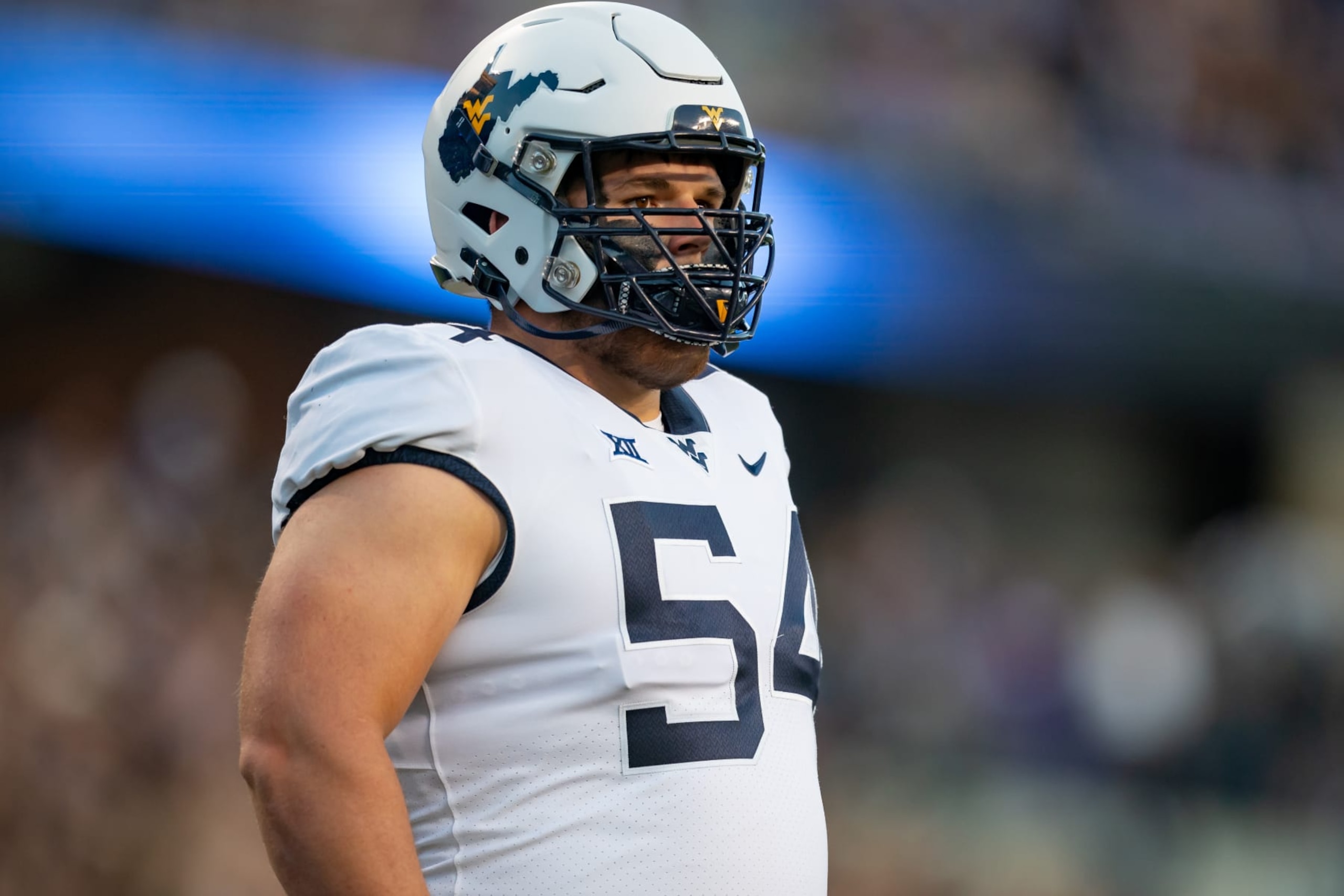 FORT WORTH, TX - SEPTEMBER 30: West Virginia Mountaineers offensive lineman Zach Frazier (54) waits for the play call during a college football game between West Virginia Mountaineers and TCU Horned Frogs on Sept 30, 2023, at Amon G Cater Stadium in Fort Worth, TX.(Photo by Christopher Leduc/Icon Sportswire via Getty Images) FORT WORTH, TX - SEPTEMBER 30: West Virginia Mountaineers offensive lineman Zach Frazier (54) waits for the play call during a college football game between West Virginia Mountaineers and TCU Horned Frogs on Sept 30, 2023, at Amon G Cater Stadium in Fort Worth, TX.(Photo by Christopher Leduc/Icon Sportswire via Getty Images)