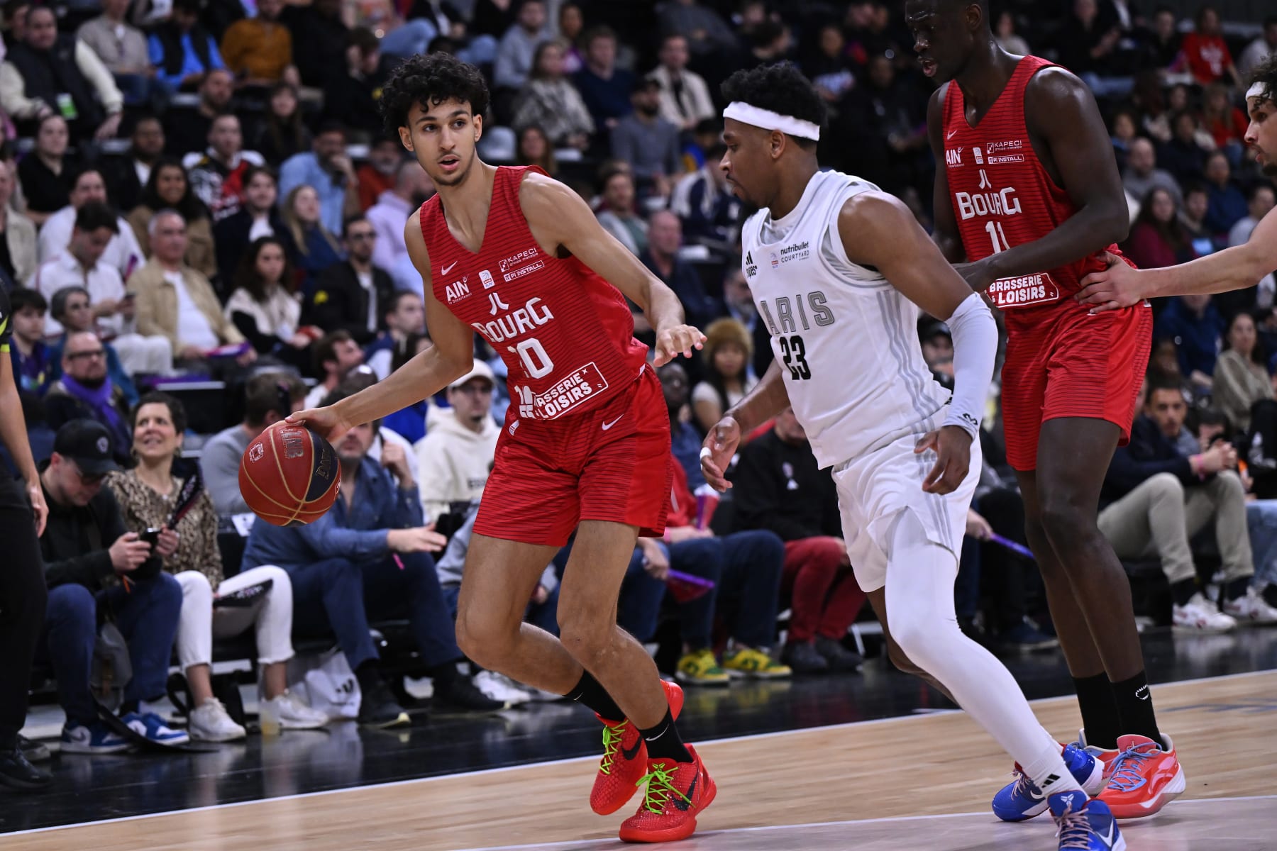 PARIS, FRANCE - APRIL 28: Zaccharie Risacher of Bourg en Bresse Basket drives to the basket during the Betclic Elite match between Paris and Bourg en Bresse Basket at Adidas Arena on April 28, 2024 in Paris, France. (Photo by Aurelien Meunier/Getty Images)