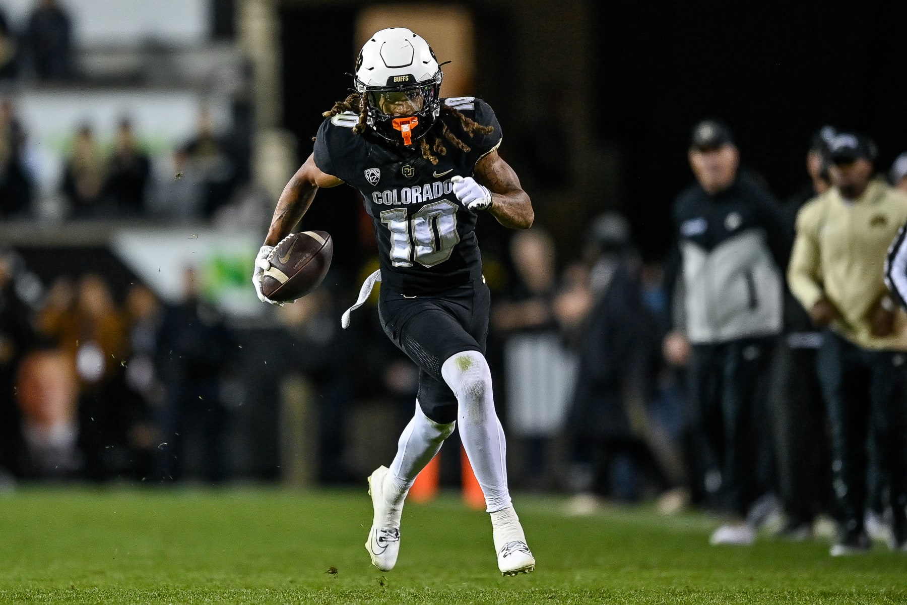BOULDER, CO - NOVEMBER 4:  Wide receiver Xavier Weaver #10 of the Colorado Buffaloes runs after catching a pass in the fourth quarter against the Oregon State Beavers at Folsom Field on November 4, 2023 in Boulder, Colorado. (Photo by Dustin Bradford/Getty Images)