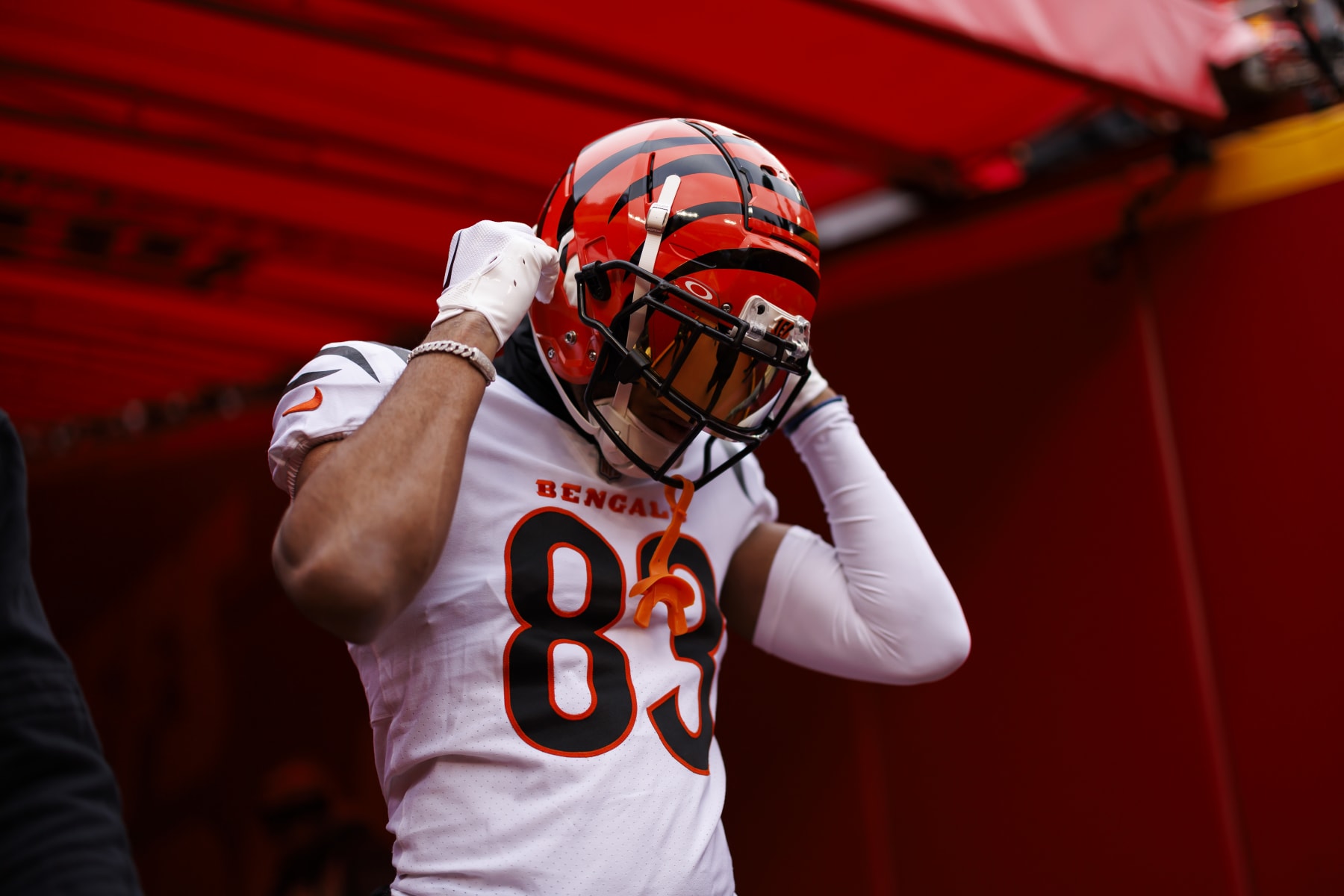 KANSAS CITY, MISSOURI - DECEMBER 31: Tyler Boyd #83 of the Cincinnati Bengals enters the field during pregame warmups before an NFL football game against the Kansas City Chiefs at GEHA Field at Arrowhead Stadium on December 31, 2023 in Kansas City, Missouri. (Photo by Ryan Kang/Getty Images)