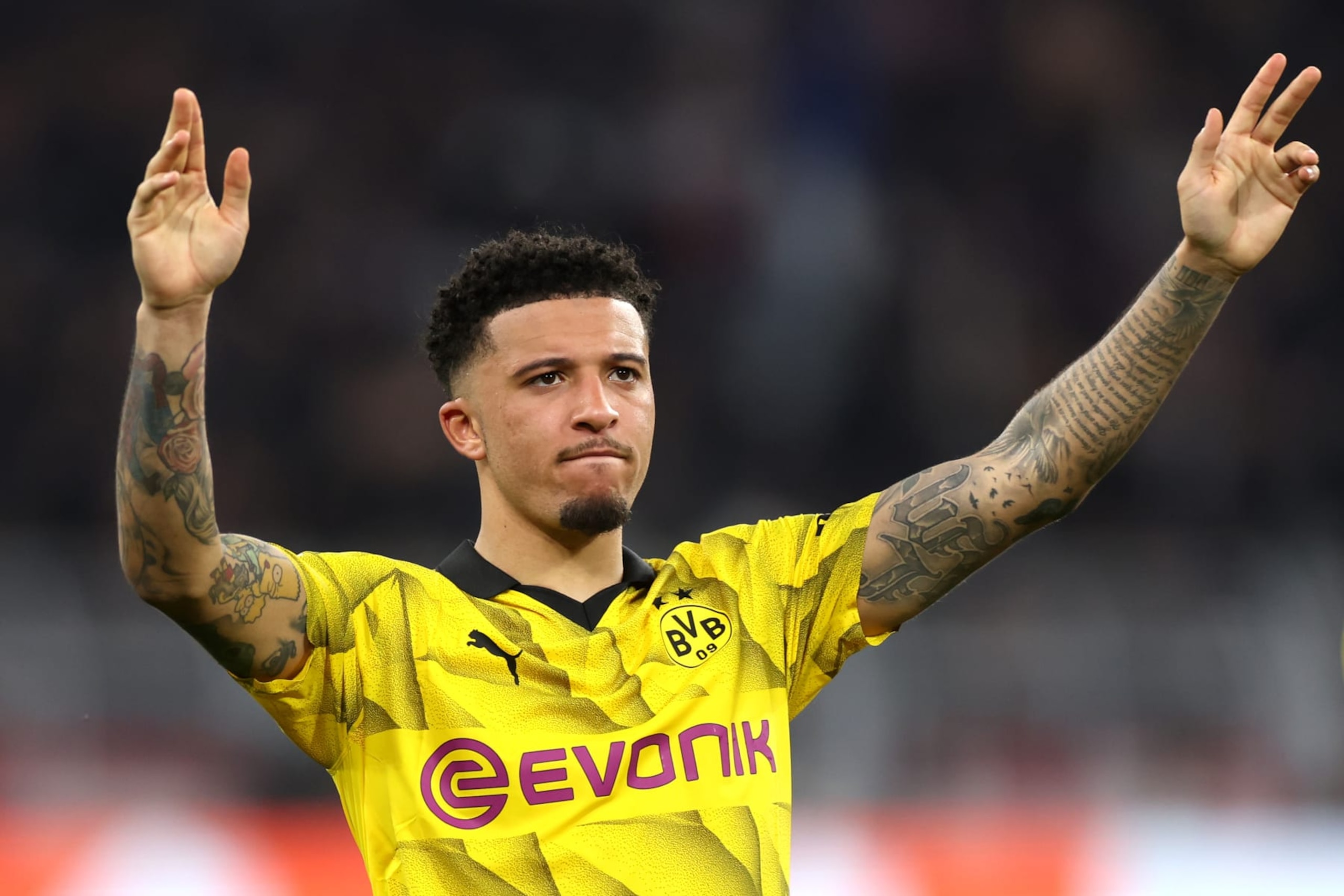 DORTMUND, GERMANY - MAY 01: Jadon Sancho of Borussia Dortmund shows appreciation to the fans at full-time following the team's victory in the UEFA Champions League semi-final first leg match between Borussia Dortmund and Paris Saint-Germain at Signal Iduna Park on May 01, 2024 in Dortmund, Germany. (Photo by Lars Baron/Getty Images) (Photo by Lars Baron/Getty Images)