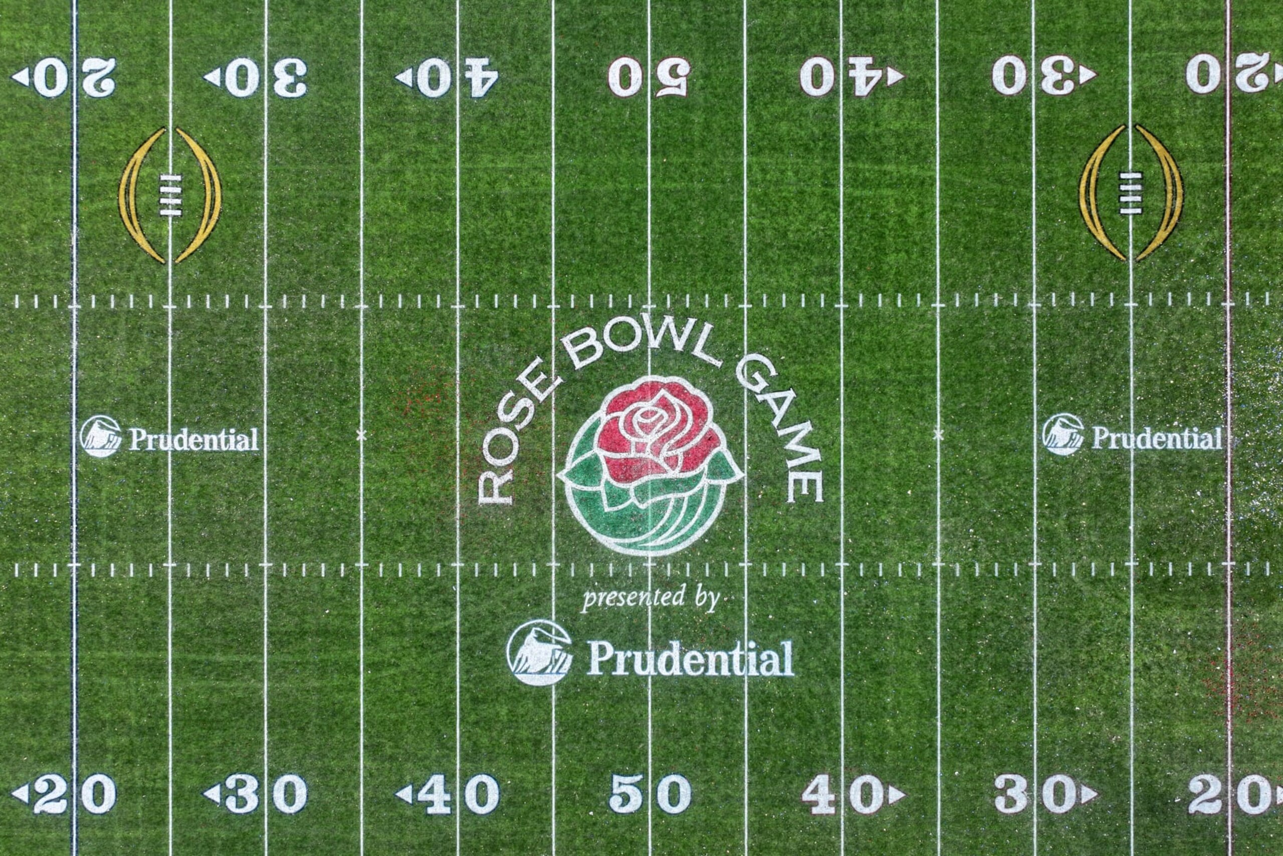 PASADENA, CALIFORNIA - JAN 2: The Rose Bowl Stadium football field with Rose Bowl Game presented by Prudential and College Football Playoff (CFP) logos on January 1, 2024 in Pasadena, California. (Photo by Kirby Lee/Getty Images)