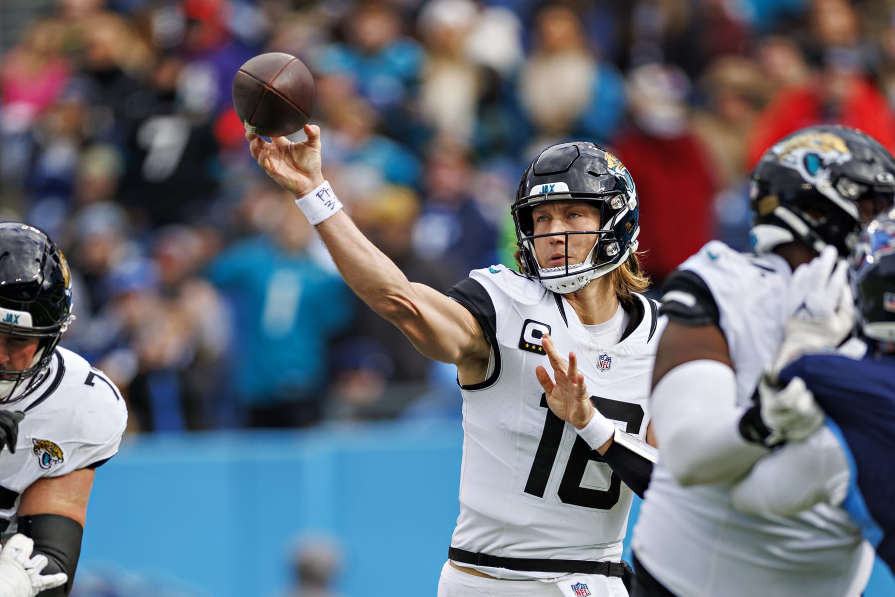 NASHVILLE TENNESSEE - JANUARY 07: Trevor Lawrence #16 of the Jacksonville Jaguars throws a pass during the game against the Tennessee Titans in Nashville, Tennessee at Nissan Stadium on January 7, 2024 in Houston, Texas. The Titans defeated the Jaguars 28-20.  (Photo by Wesley Hitt/Getty Images)