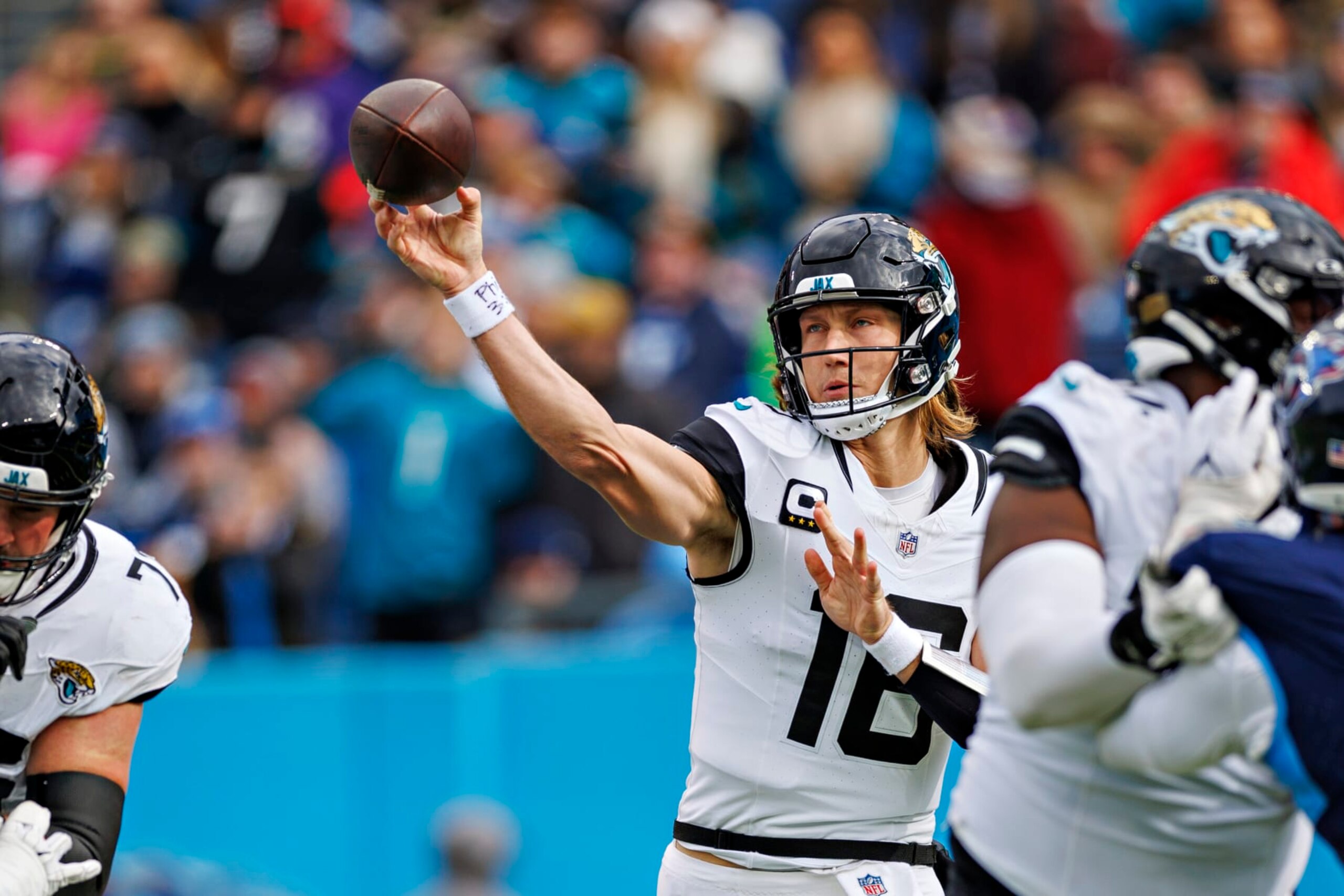 NASHVILLE TENNESSEE - JANUARY 07: Trevor Lawrence #16 of the Jacksonville Jaguars throws a pass during the game against the Tennessee Titans in Nashville, Tennessee at Nissan Stadium on January 7, 2024 in Houston, Texas. The Titans defeated the Jaguars 28-20.  (Photo by Wesley Hitt/Getty Images)
