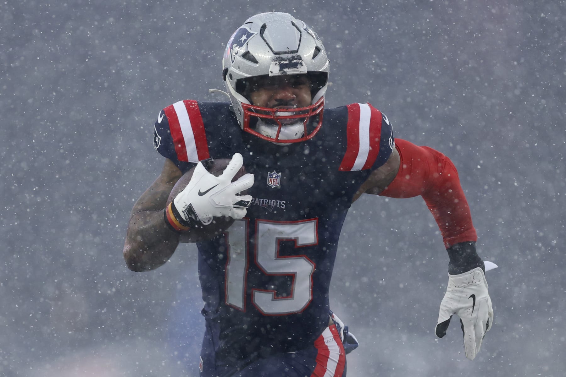 Foxborough, MA - January 7: New England Patriots RB Ezekiel Elliott rushes in the first half. The Patriots lost to the New York Jets, 17-3. (Photo by Danielle Parhizkaran/The Boston Globe via Getty Images)
