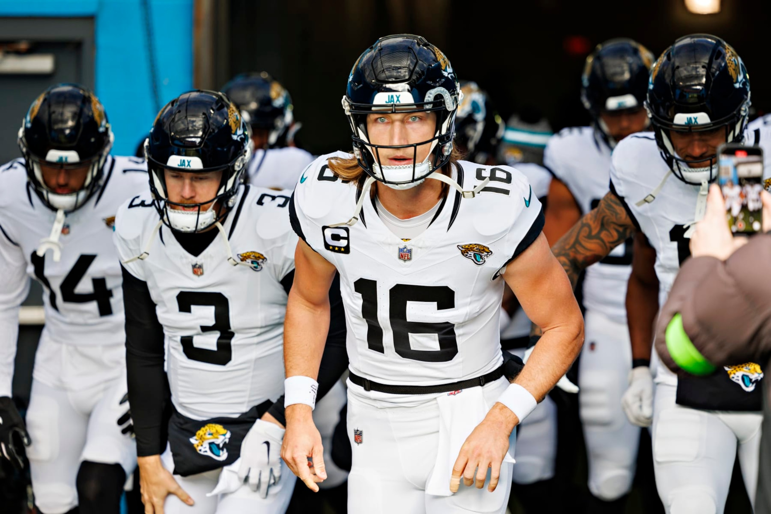 NASHVILLE TENNESSEE - JANUARY 07: Trevor Lawrence #16 and the offense of the Jacksonville Jaguars run onto the field before the game against the Tennessee Titans in Nashville, Tennessee at Nissan Stadium on January 7, 2024 in Houston, Texas. The Titans defeated the Jaguars 28-20. (Photo by Wesley Hitt/Getty Images) NASHVILLE TENNESSEE - JANUARY 07: Trevor Lawrence #16 and the offense of the Jacksonville Jaguars run onto the field before the game against the Tennessee Titans in Nashville, Tennessee at Nissan Stadium on January 7, 2024 in Houston, Texas. The Titans defeated the Jaguars 28-20. (Photo by Wesley Hitt/Getty Images)