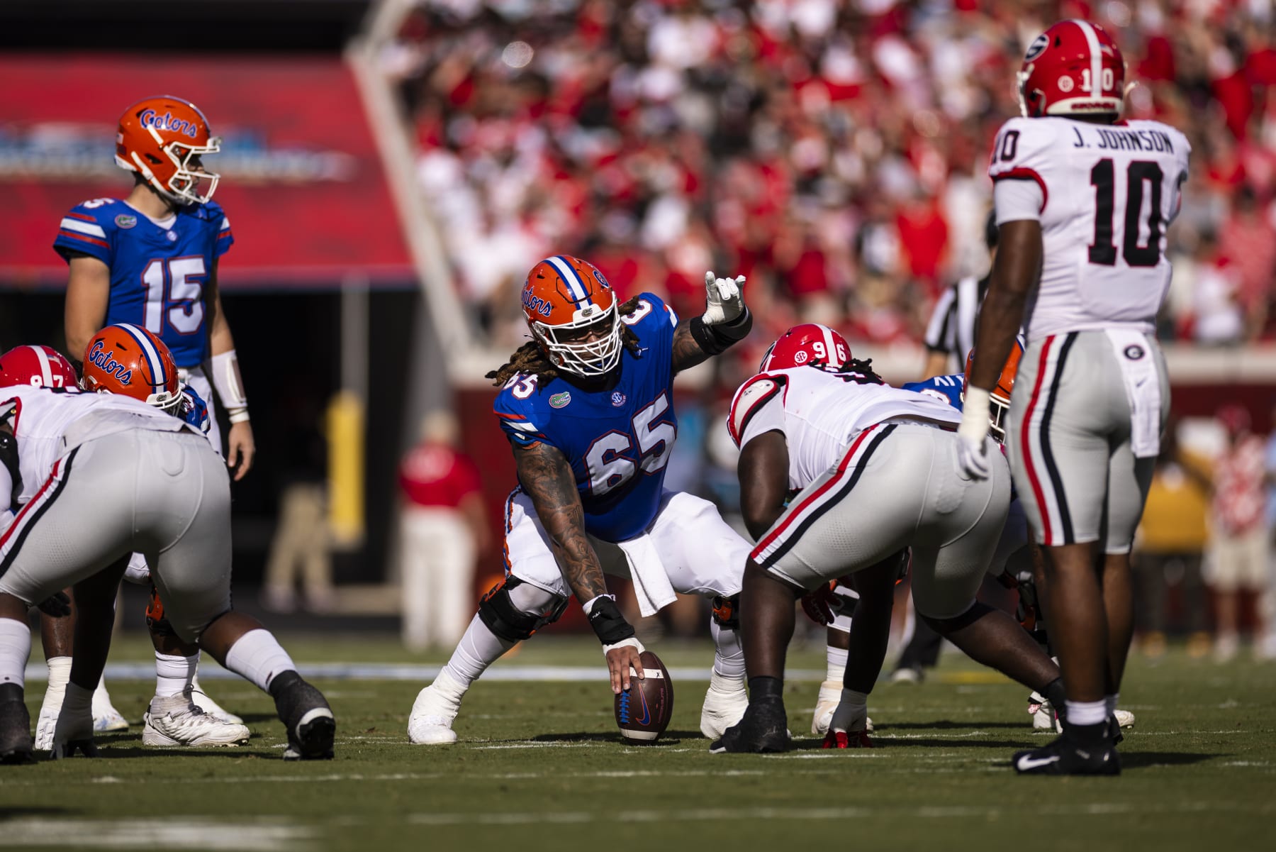 JACKSONVILLE, FLORIDA - OCTOBER 28: Kingsley Eguakun #65 of the Florida Gators looks on during the first half of a game against the Georgia Bulldogs at EverBank Stadium on October 28, 2023 in Jacksonville, Florida. (Photo by James Gilbert/Getty Images)