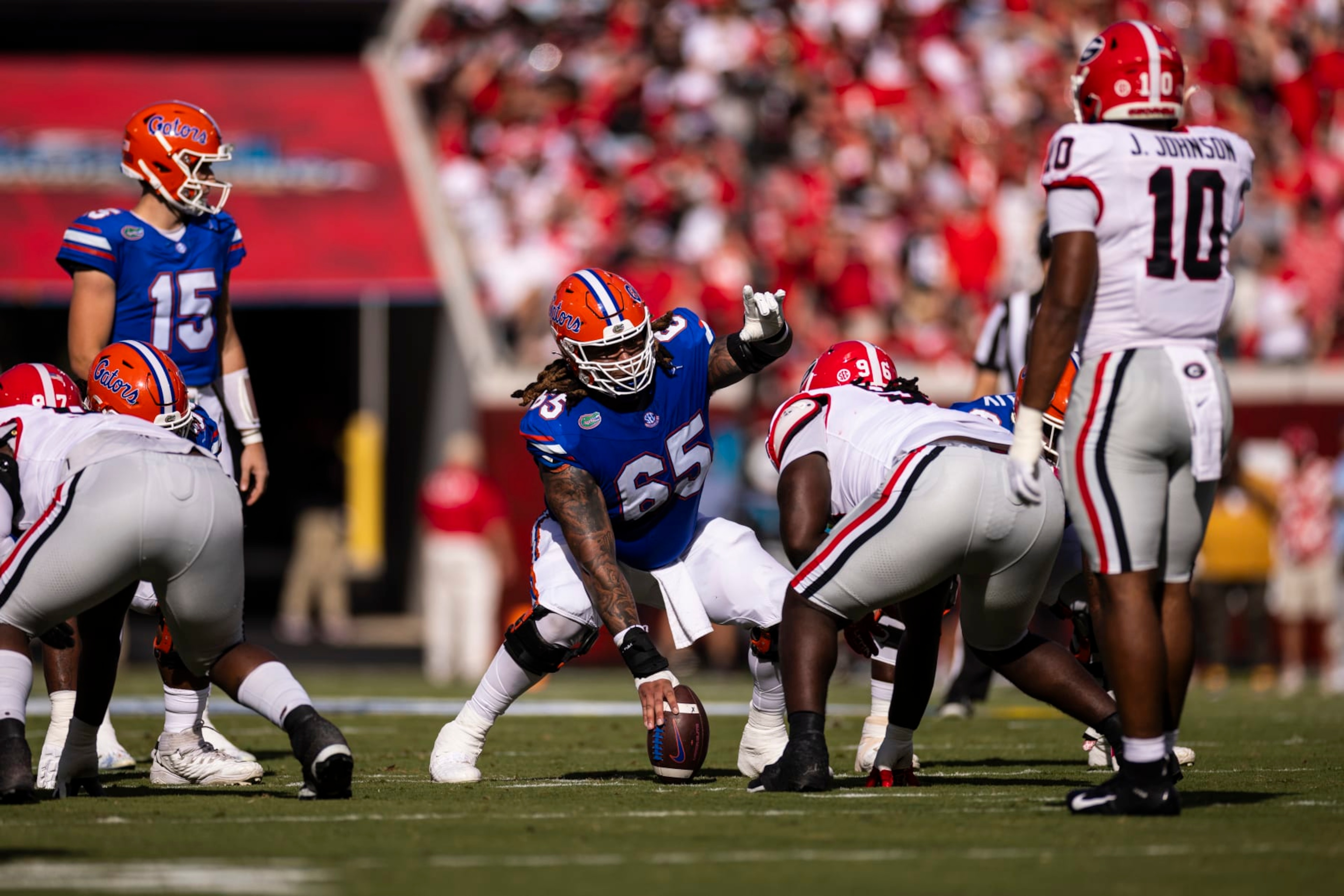 JACKSONVILLE, FLORIDA - OCTOBER 28: Kingsley Eguakun #65 of the Florida Gators looks on during the first half of a game against the Georgia Bulldogs at EverBank Stadium on October 28, 2023 in Jacksonville, Florida. (Photo by James Gilbert/Getty Images)