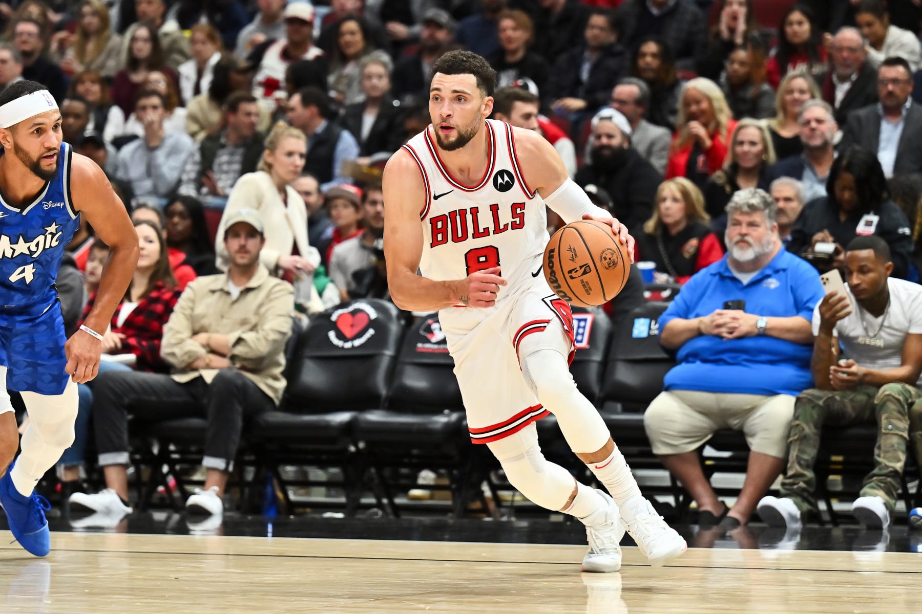 CHICAGO, ILLINOIS - NOVEMBER 15:  Zach Lavine #8 of the Chicago Bulls controls the ball against the Orlando Magic on November 15, 2023 at United Center in Chicago, Illinois.   NOTE TO USER: User expressly acknowledges and agrees that, by downloading and or using this photograph, User is consenting to the terms and conditions of the Getty Images License Agreement.  (Photo by Jamie Sabau/Getty Images)