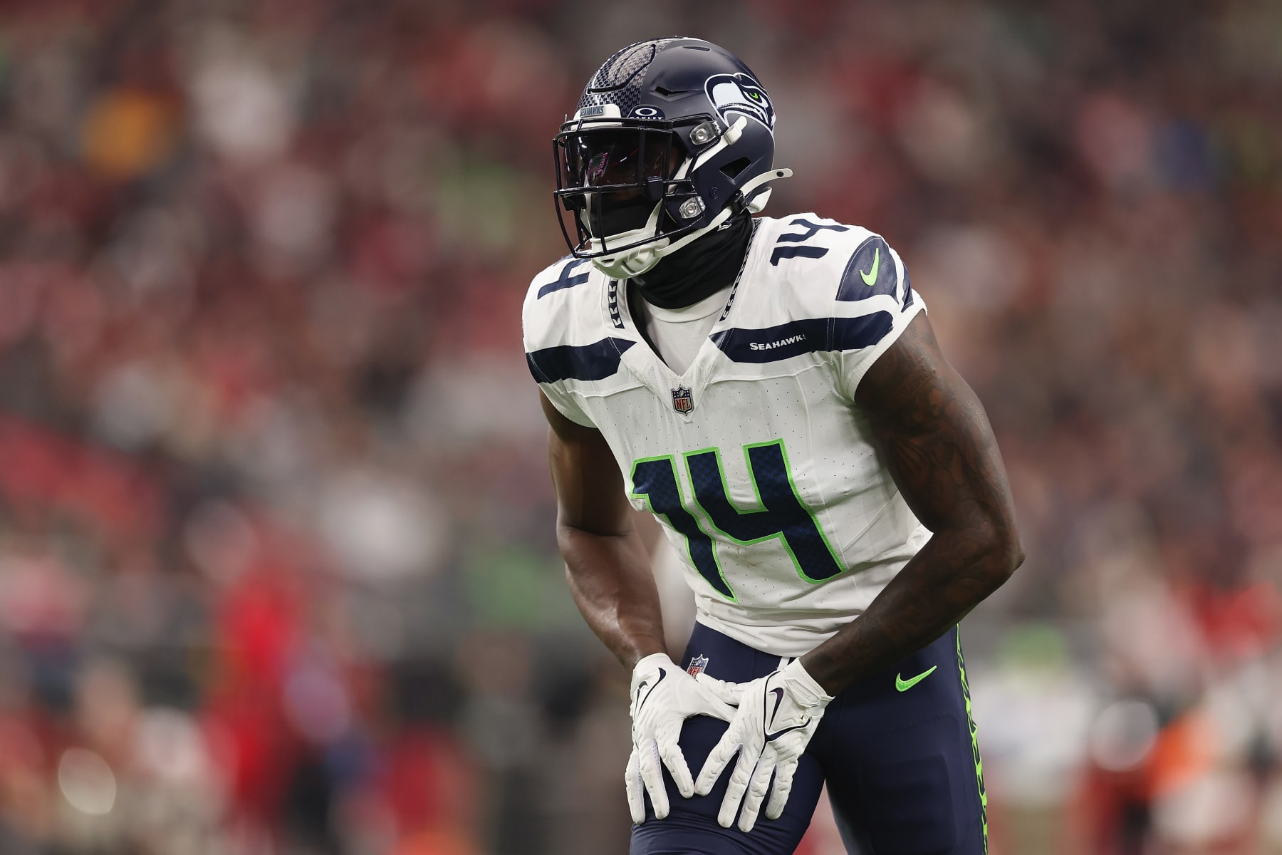 GLENDALE, ARIZONA - JANUARY 07: Wide receiver DK Metcalf #14 of the Seattle Seahawks during the first half of the NFL game at State Farm Stadium on January 07, 2024 in Glendale, Arizona. (Photo by Christian Petersen/Getty Images)